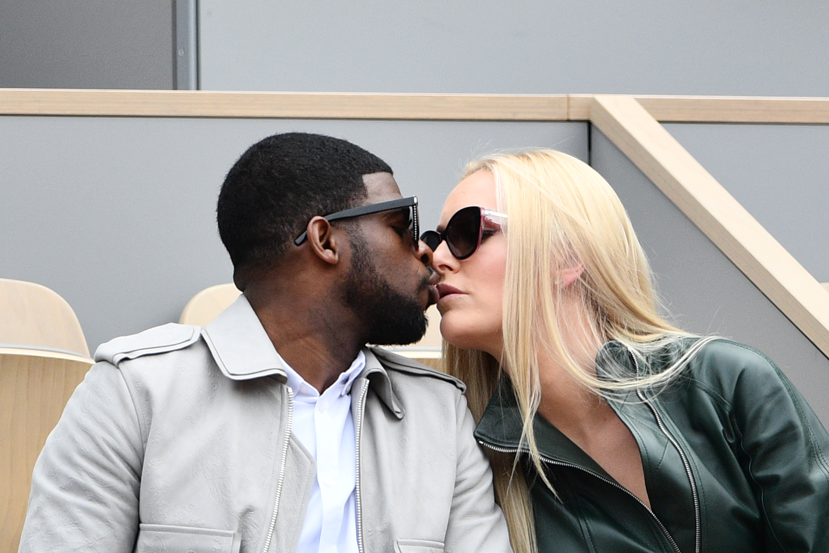 P.K. Subban and Lindsey Vonn wear sunglasses and smooch