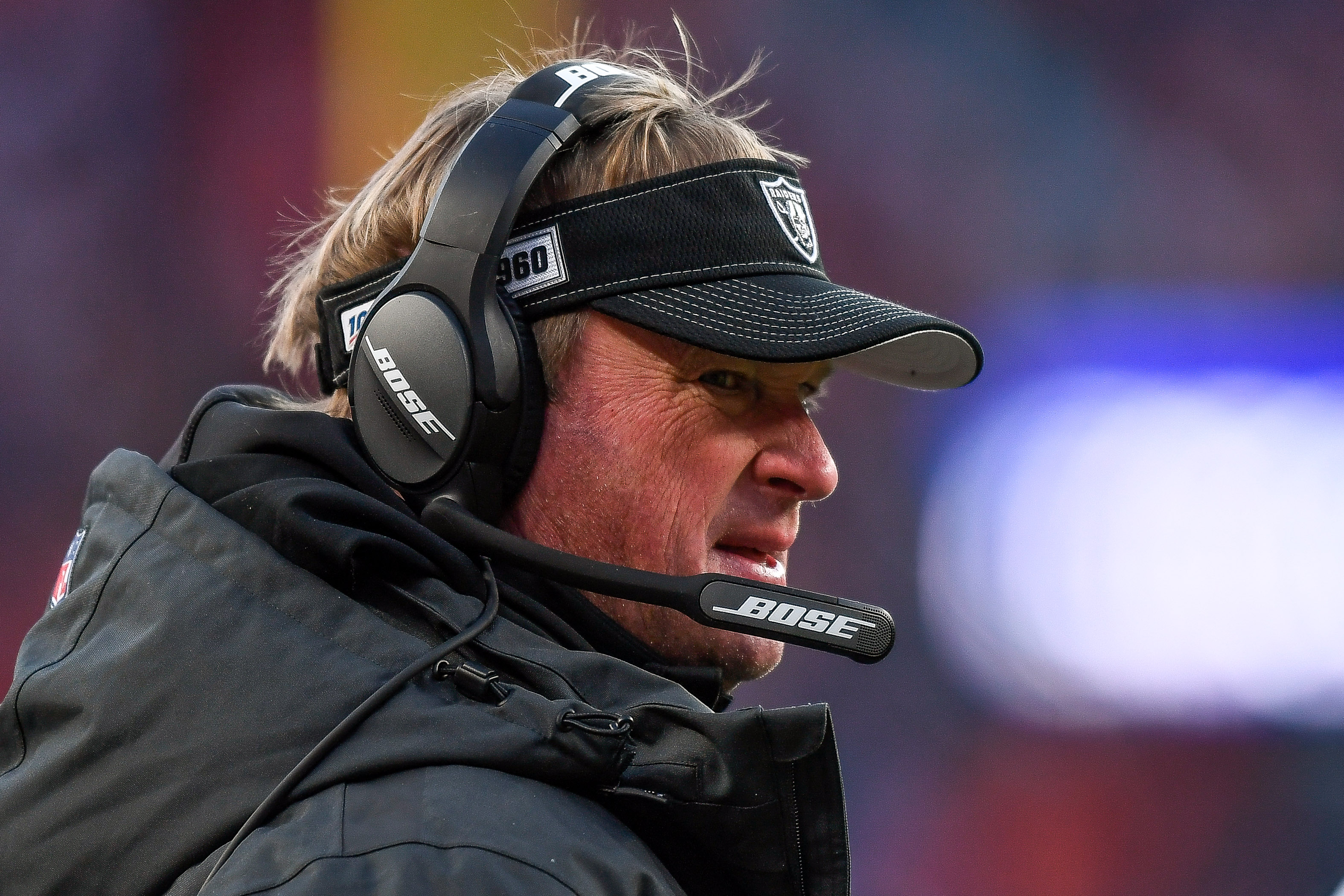 Head coach Jon Gruden of the Oakland Raiders looks on from the sideline during a game