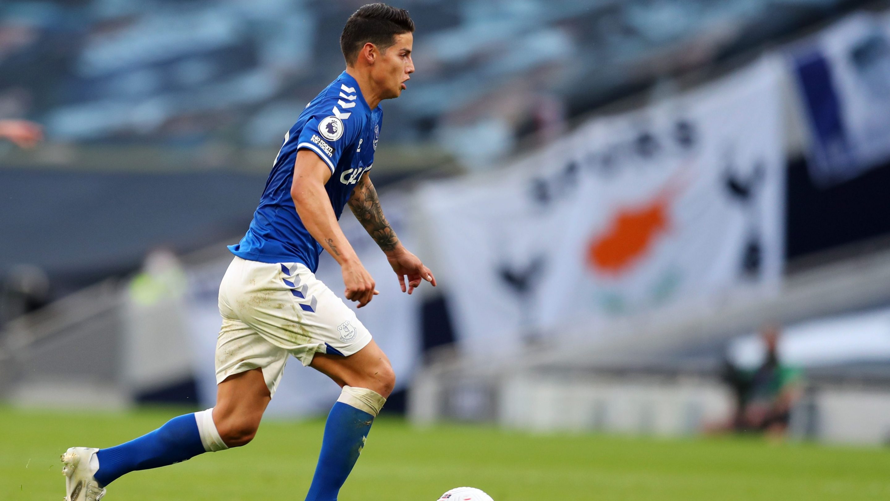 James of Everton dribbles against Tottenham