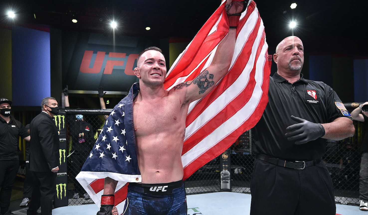 Colby Covington gets his hand raised in an empty arena.
