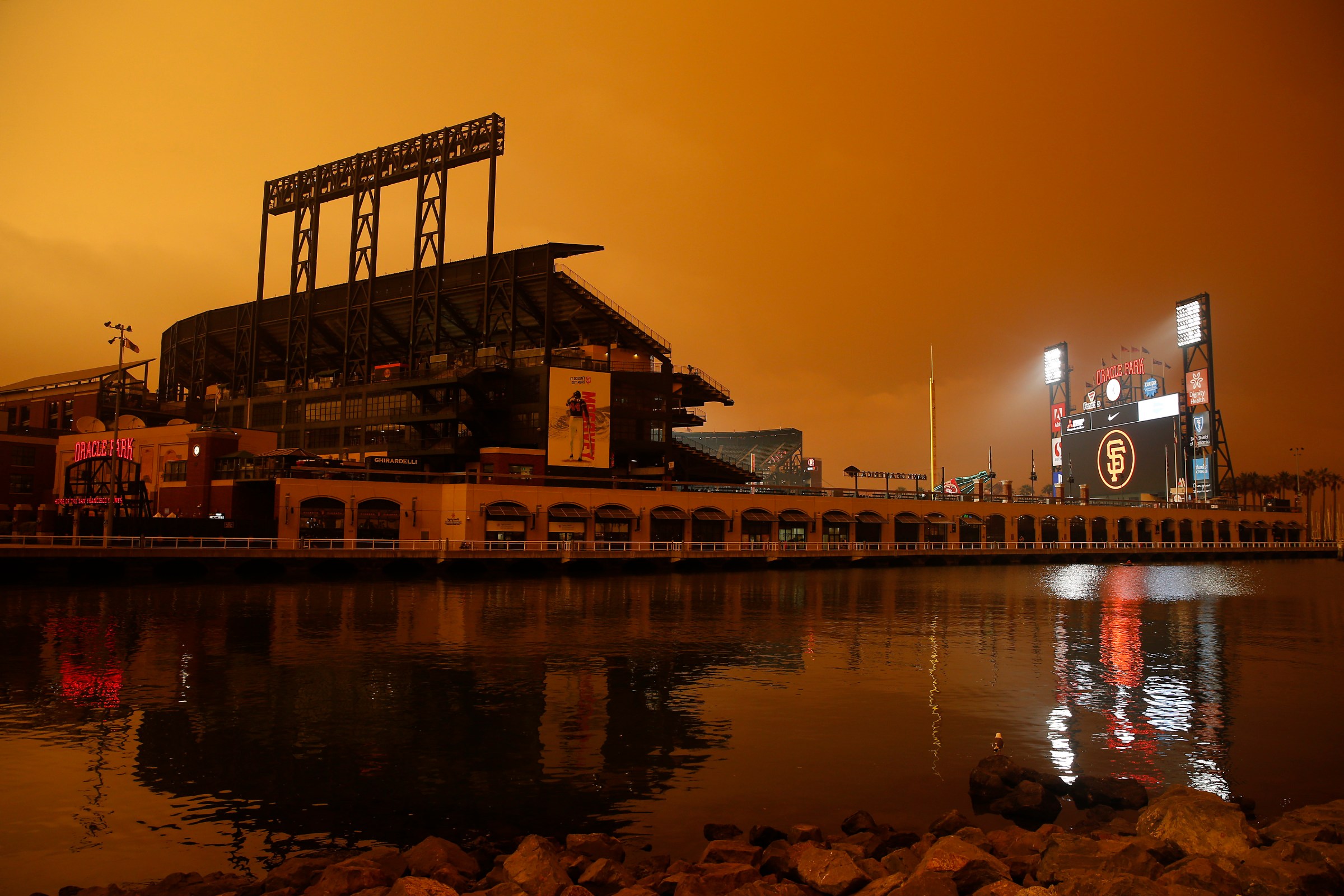 SAN FRANCISCO, CALIFORNIA - SEPTEMBER 09: An exterior view of the ballpark before the game between the San Francisco Giants and the Seattle Mariners at Oracle Park on September 09, 2020 in San Francisco, California. Smoke from various wildfires burning across Northern California has blanketed the city in an orange glow. (Photo by Lachlan Cunningham/Getty Images)