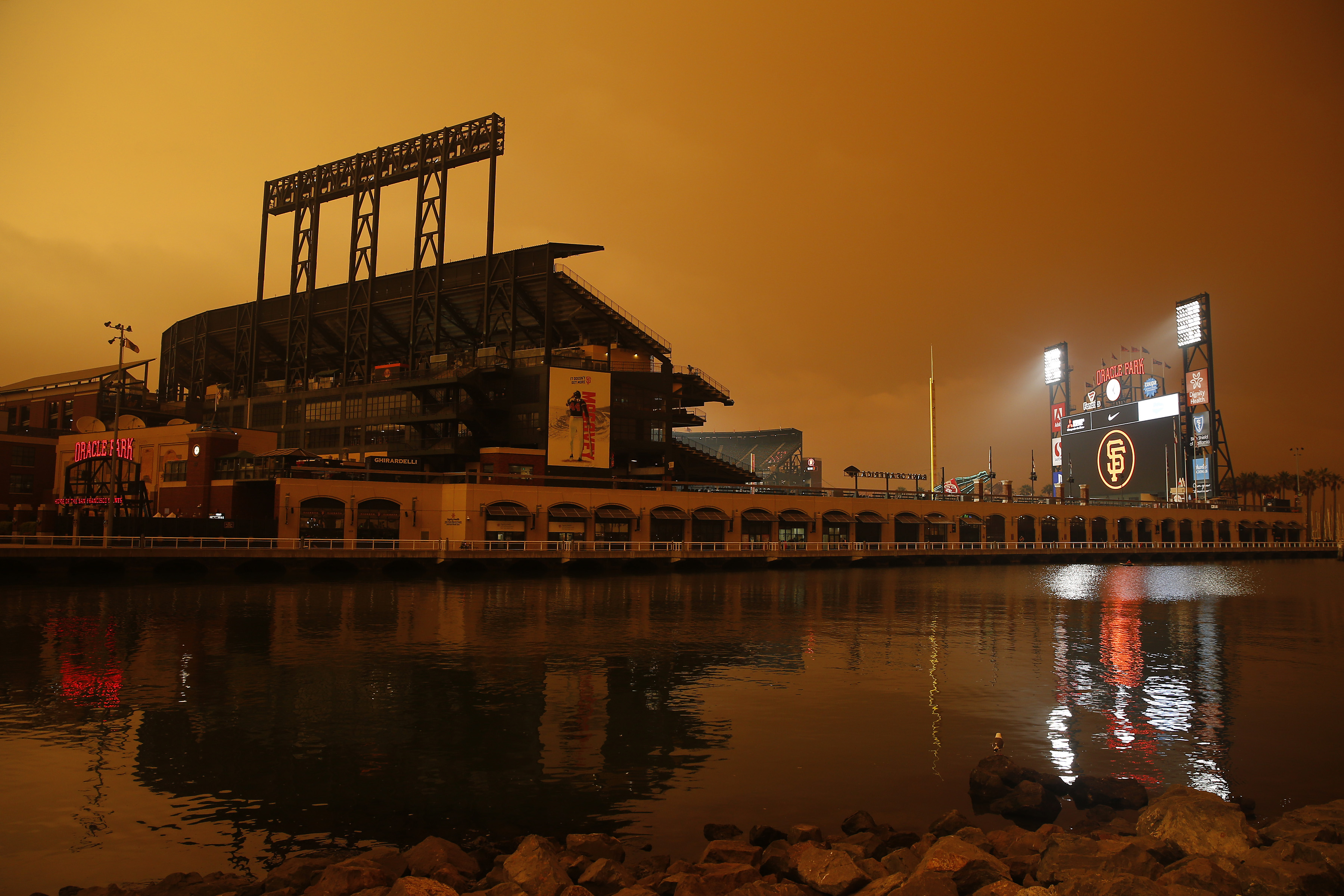 SAN FRANCISCO, CALIFORNIA - SEPTEMBER 09: An exterior view of the ballpark before the game between the San Francisco Giants and the Seattle Mariners at Oracle Park on September 09, 2020 in San Francisco, California. Smoke from various wildfires burning across Northern California has blanketed the city in an orange glow. (Photo by Lachlan Cunningham/Getty Images)