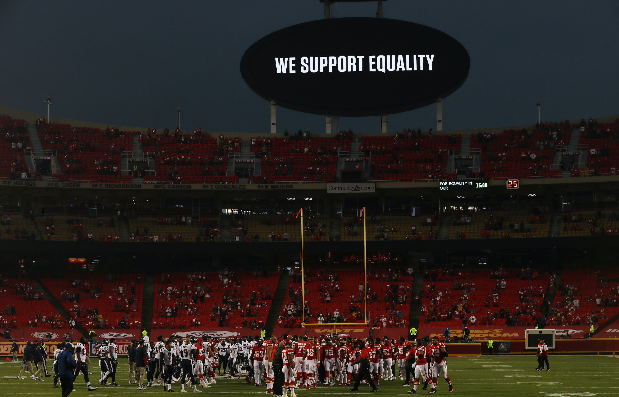 KANSAS CITY, MISSOURI - SEPTEMBER 10: Players from the Kansas City Chiefs and Houston Texans unite in a moment of silence before the start of a game at Arrowhead Stadium on September 10, 2020 in Kansas City, Missouri. (Photo by Jamie Squire/Getty Images)