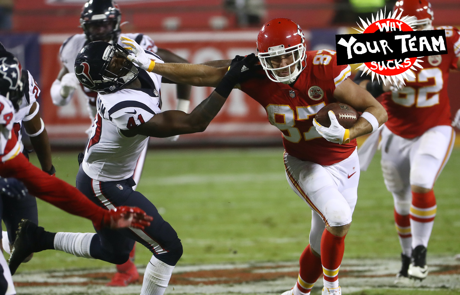 KANSAS CITY, MISSOURI - SEPTEMBER 10: Travis Kelce #87 of the Kansas City Chiefs stiff arms Zach Cunningham #41 of the Houston Texans during the second quarter at Arrowhead Stadium on September 10, 2020 in Kansas City, Missouri. (Photo by Jamie Squire/Getty Images)