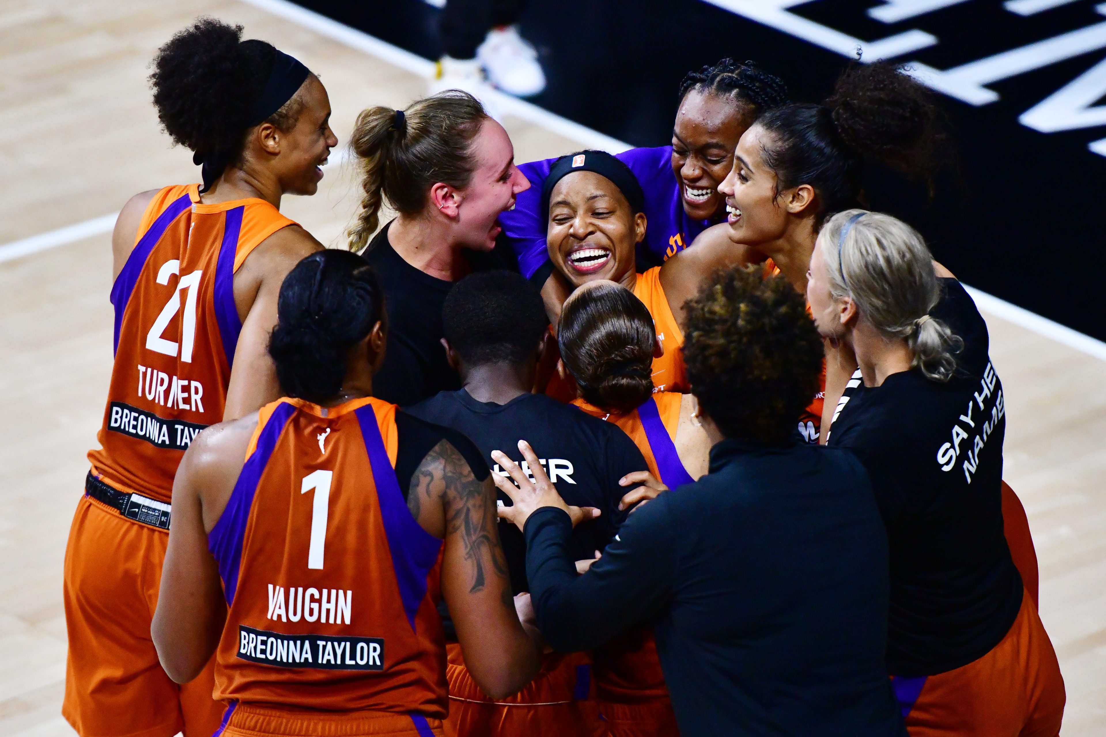 Shey Peddy #5 of the Phoenix Mercury is surrounded by teammates after hitting a 3-point buzzer beater to defeat the Washington Mystics at Feld Entertainment Center on September 15, 2020