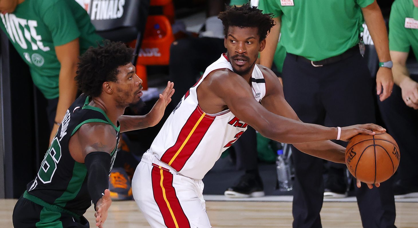 Jimmy Butler #22 of the Miami Heat handles the ball as Marcus Smart #36 of the Boston Celtics defends during the third quarter in Game Two of the Eastern Conference Finals during the 2020 NBA Playoffs at AdventHealth Arena at the ESPN Wide World Of Sports Complex on September 17, 2020 in Lake Buena Vista, Florida.