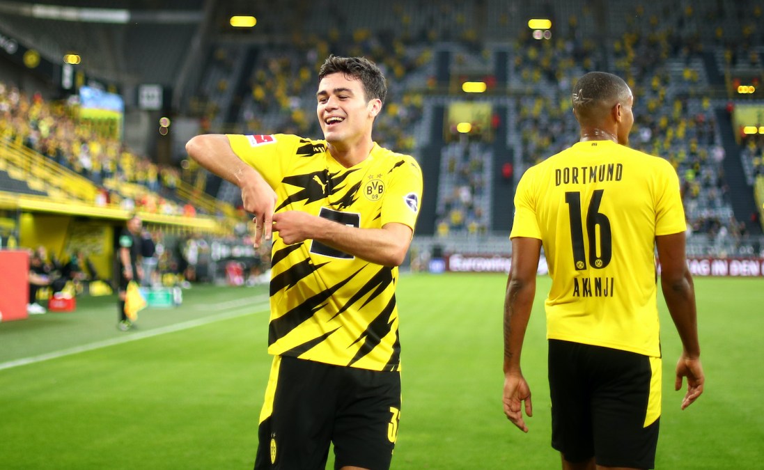 DORTMUND, GERMANY - SEPTEMBER 19: Giovanni Reyna of Borussia Dortmund celebrates after scoring his team's first goal during the Bundesliga match between Borussia Dortmund and Borussia Moenchengladbach at Signal Iduna Park on September 19, 2020 in Dortmund, Germany. Fans are set to return to Bundesliga stadiums in Germany despite to the ongoing Coronavirus Pandemic. Up to 20% of stadium's capacity are allowed to be filled. Final decisions are left to local health authorities and are subject to club's hygiene concepts and the infection numbers in the corresponding region. (Photo by Dean Mouhtaropoulos/Getty Images)