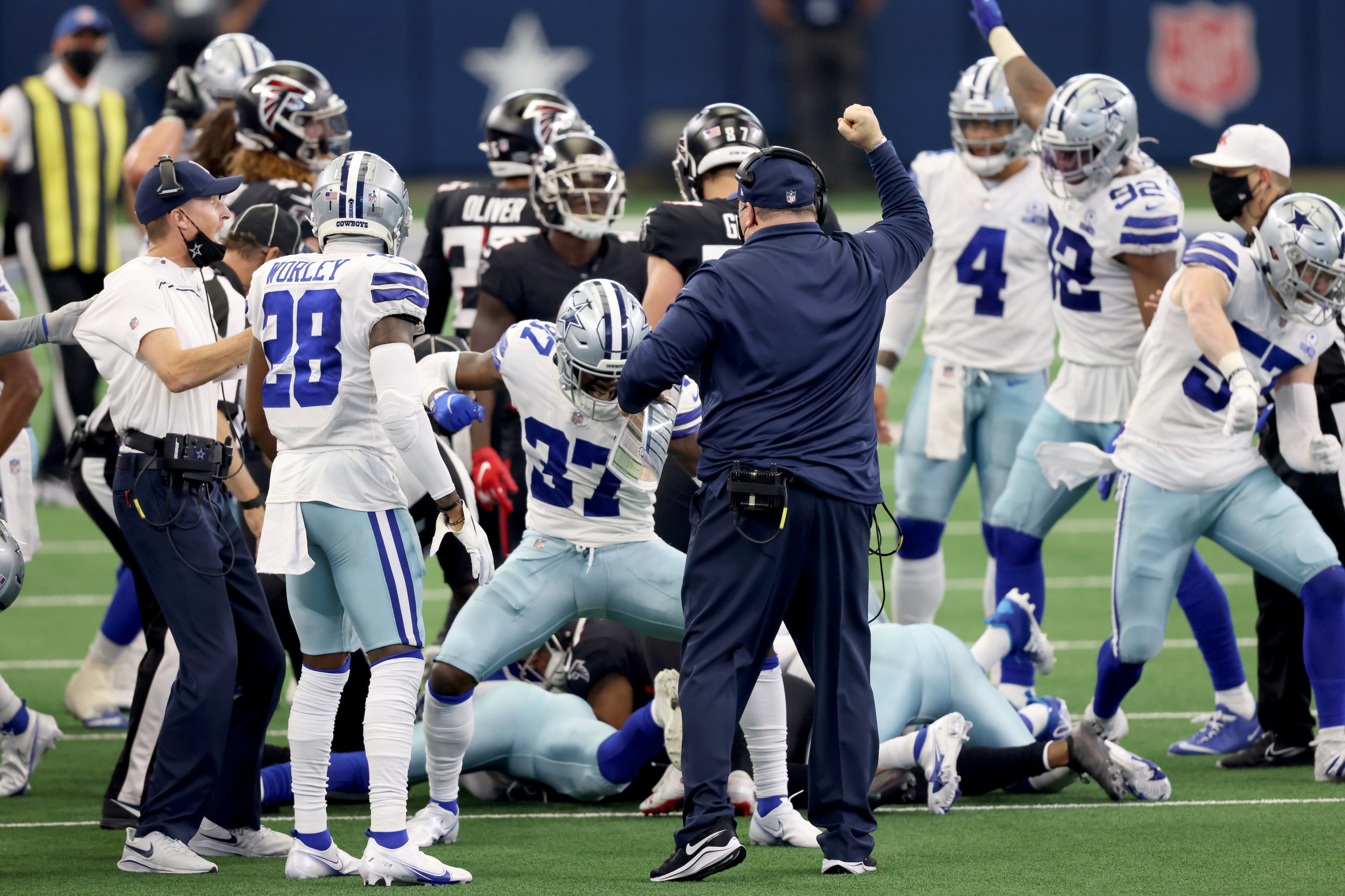 Dallas Cowboys players react to onside kick recovery
