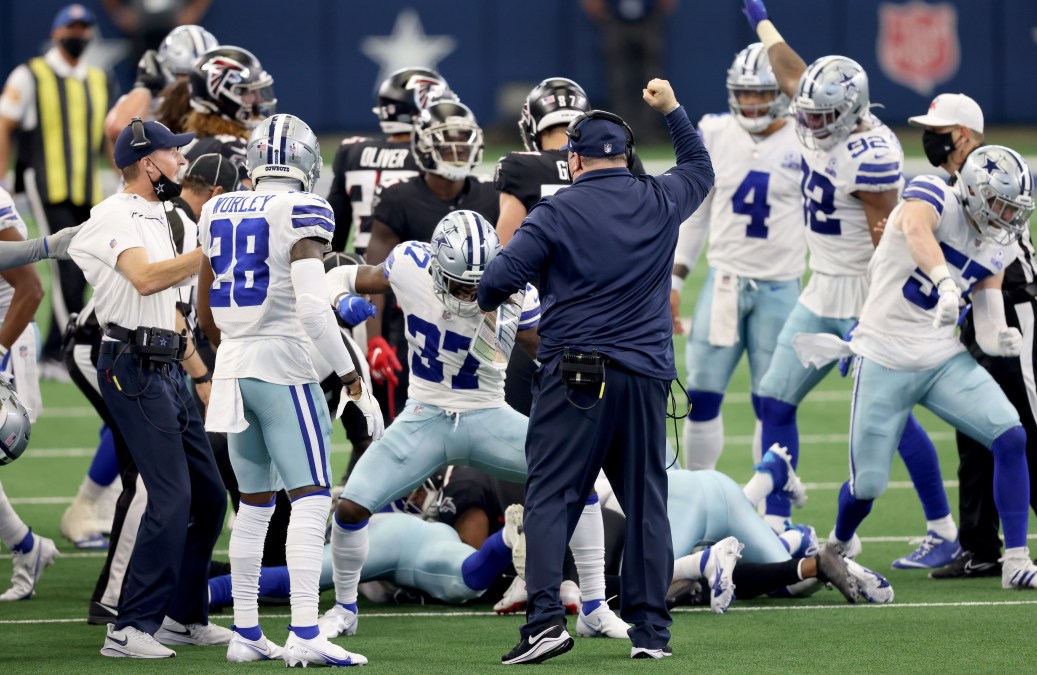 Dallas Cowboys players react to onside kick recovery