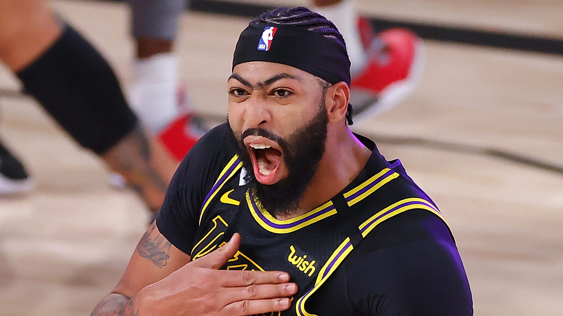 LAKE BUENA VISTA, FLORIDA - SEPTEMBER 20: Anthony Davis #3 of the Los Angeles Lakers celebrates after shooting a three point basket to win the game over Denver Nuggets in Game Two of the Western Conference Finals during the 2020 NBA Playoffs at AdventHealth Arena at the ESPN Wide World Of Sports Complex on September 20, 2020 in Lake Buena Vista, Florida.
