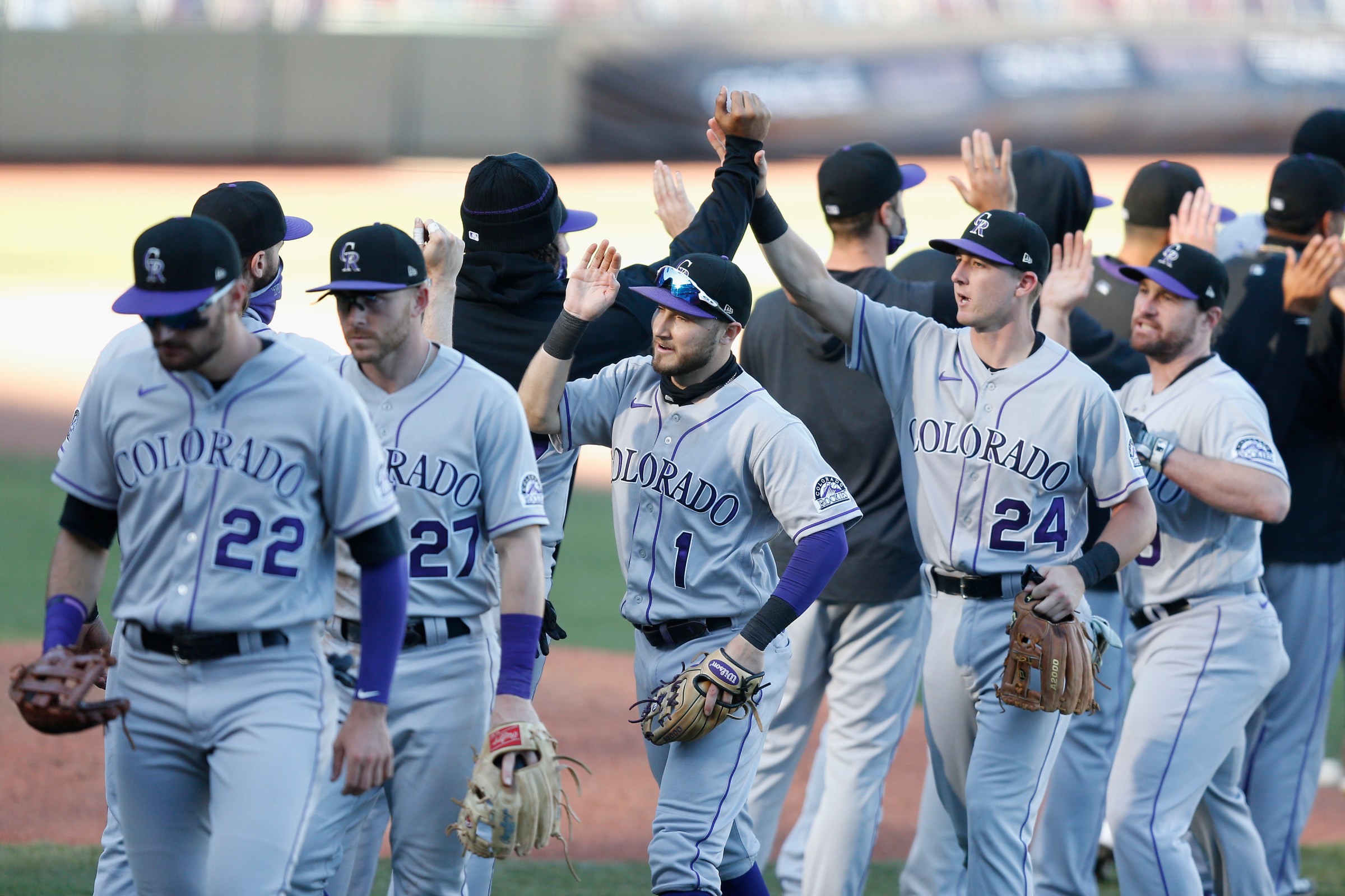 Colorado Rockies players celebrate after their win against the San Francisco Giants