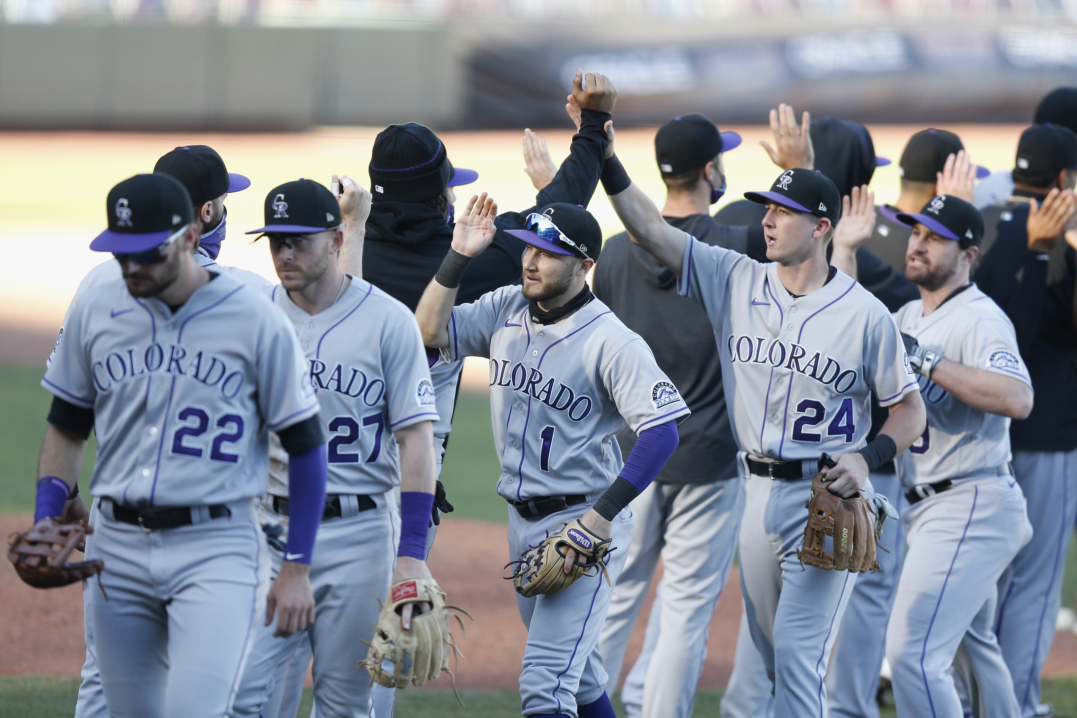 Colorado Rockies players celebrate after their win against the San Francisco Giants