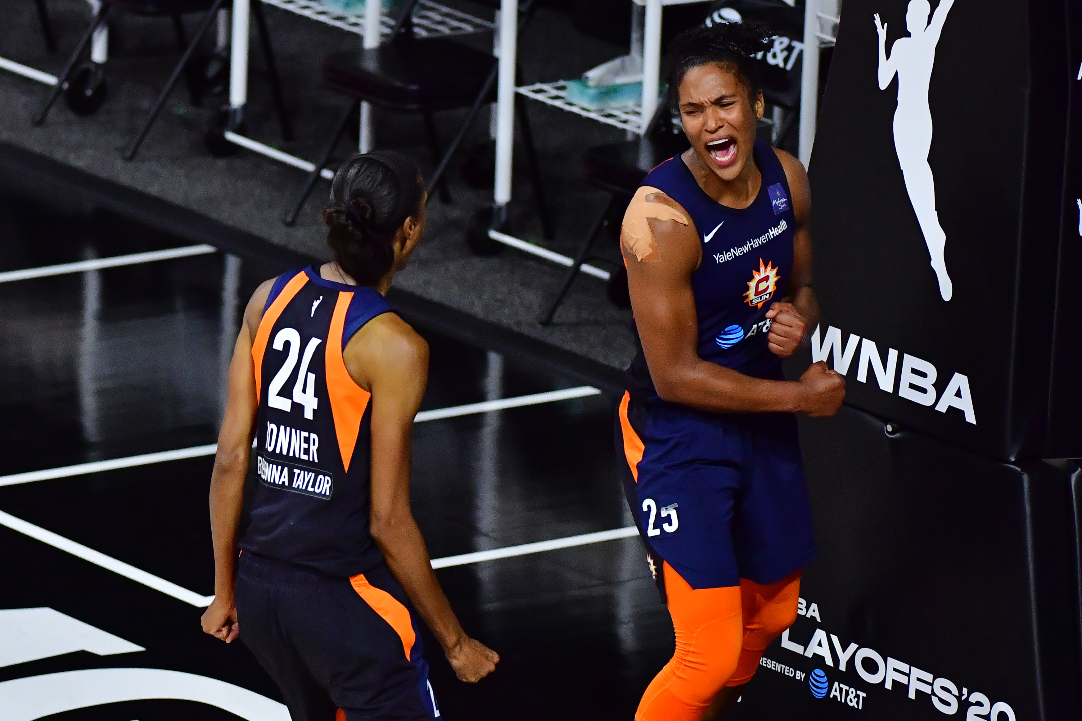 Alyssa Thomas #25 of the Connecticut Sun celebrates with DeWanna Bonner #24 after converting a steal in the fourth quarter against the Las Vegas Aces during Game Three of their Third Round playoff at Feld Entertainment Center on September 24, 2020 in Palmetto, Florida.