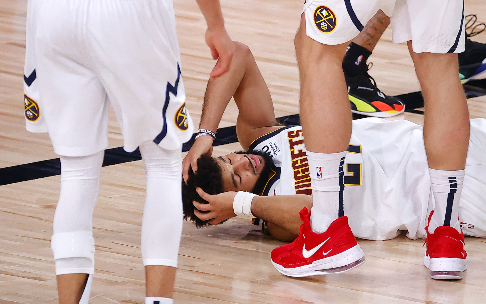 LAKE BUENA VISTA, FLORIDA - SEPTEMBER 26: Jamal Murray #27 of the Denver Nuggets reacts during the fourth quarter against the Los Angeles Lakers in Game Five of the Western Conference Finals during the 2020 NBA Playoffs at AdventHealth Arena at the ESPN Wide World Of Sports Complex on September 26, 2020 in Lake Buena Vista, Florida. NOTE TO USER: User expressly acknowledges and agrees that, by downloading and or using this photograph, User is consenting to the terms and conditions of the Getty Images License Agreement. (Photo by Kevin C. Cox/Getty Images)