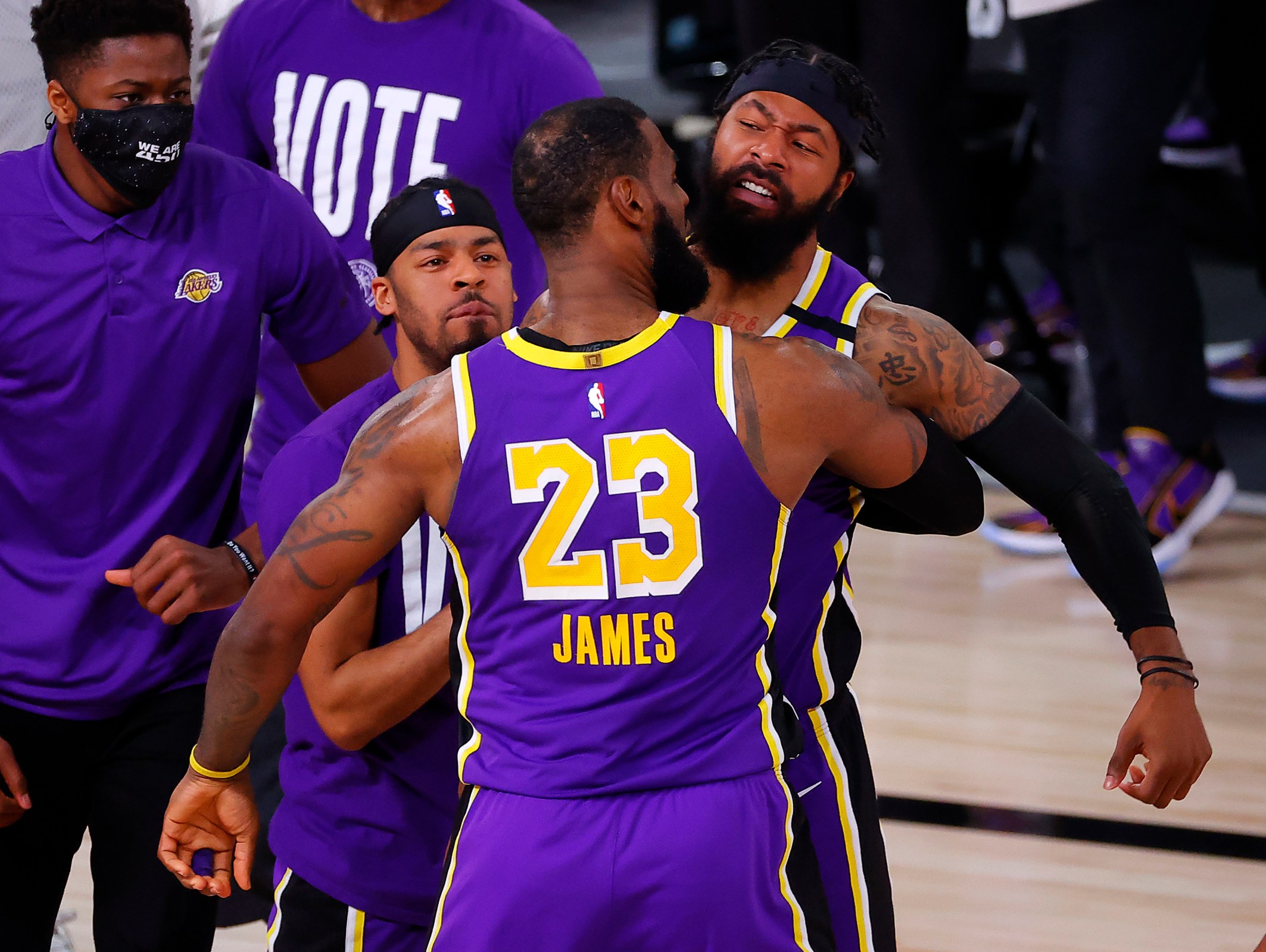 LeBron James and Markieff Morris of the Lakers chest-bump during a victorious Game 5 of the Western Conference Finals.