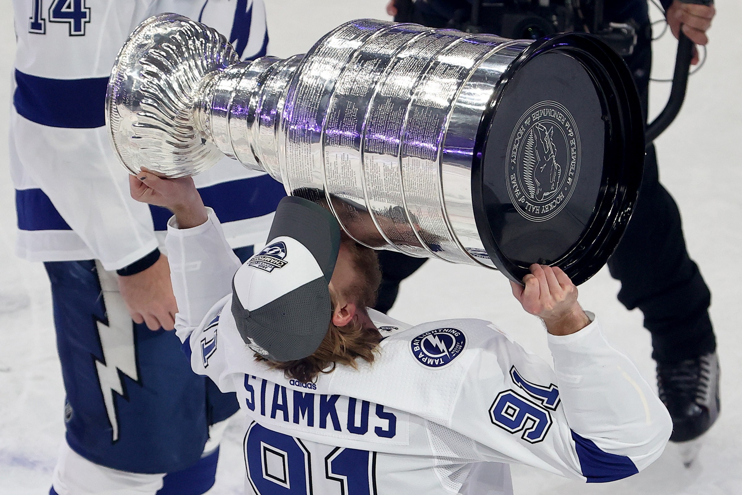 Steven Stamkos #91 of the Tampa Bay Lightning skates with the Stanley Cup following the series-winning victory over the Dallas Stars