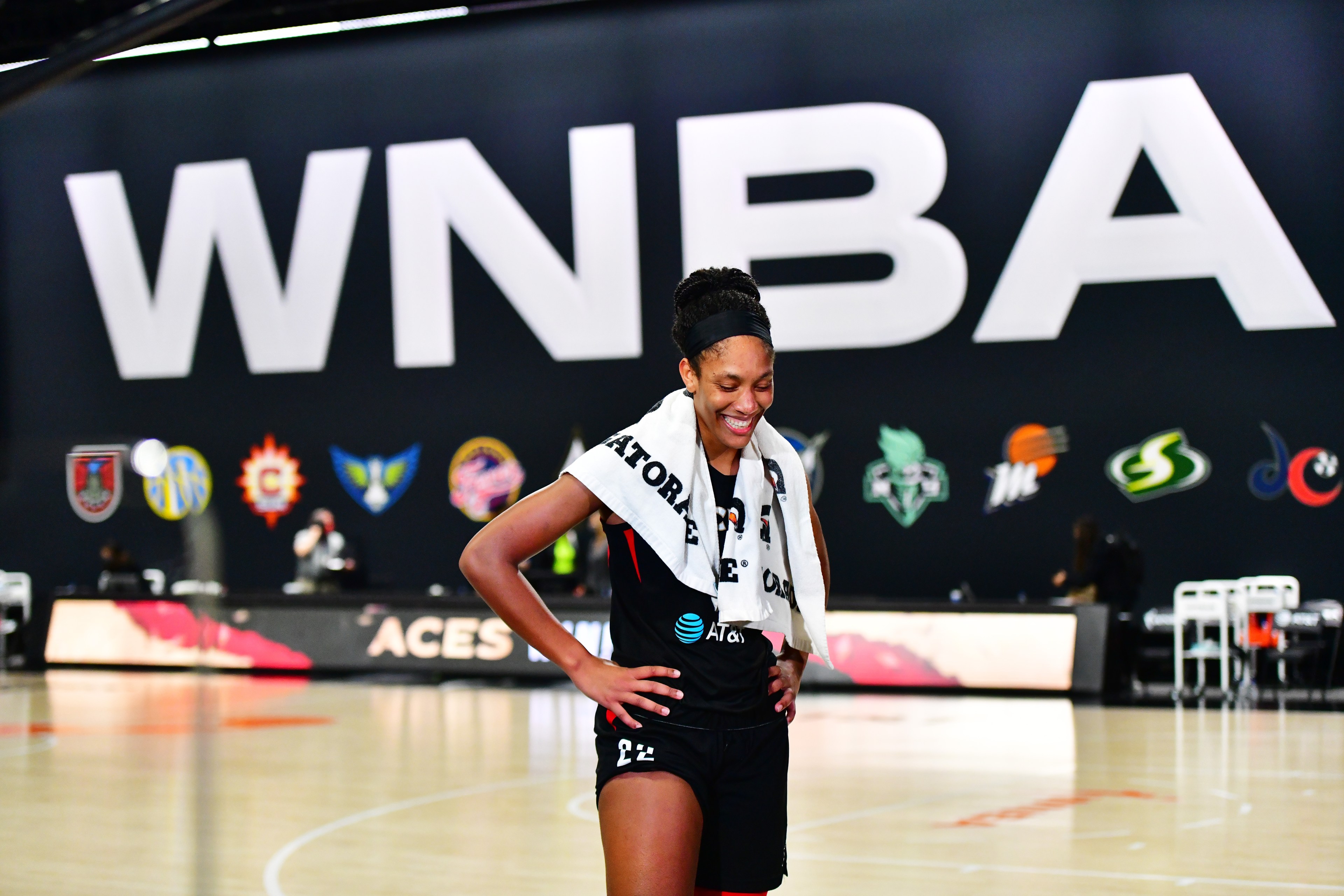 A'ja Wilson #22 of the Las Vegas Aces smiles while getting interviewed after defeating the Connecticut Sun 66-63 to advance to the WNBA finals following Game Five of their Third Round playoff at Feld Entertainment Center on September 29, 2020 in Palmetto, Florida.