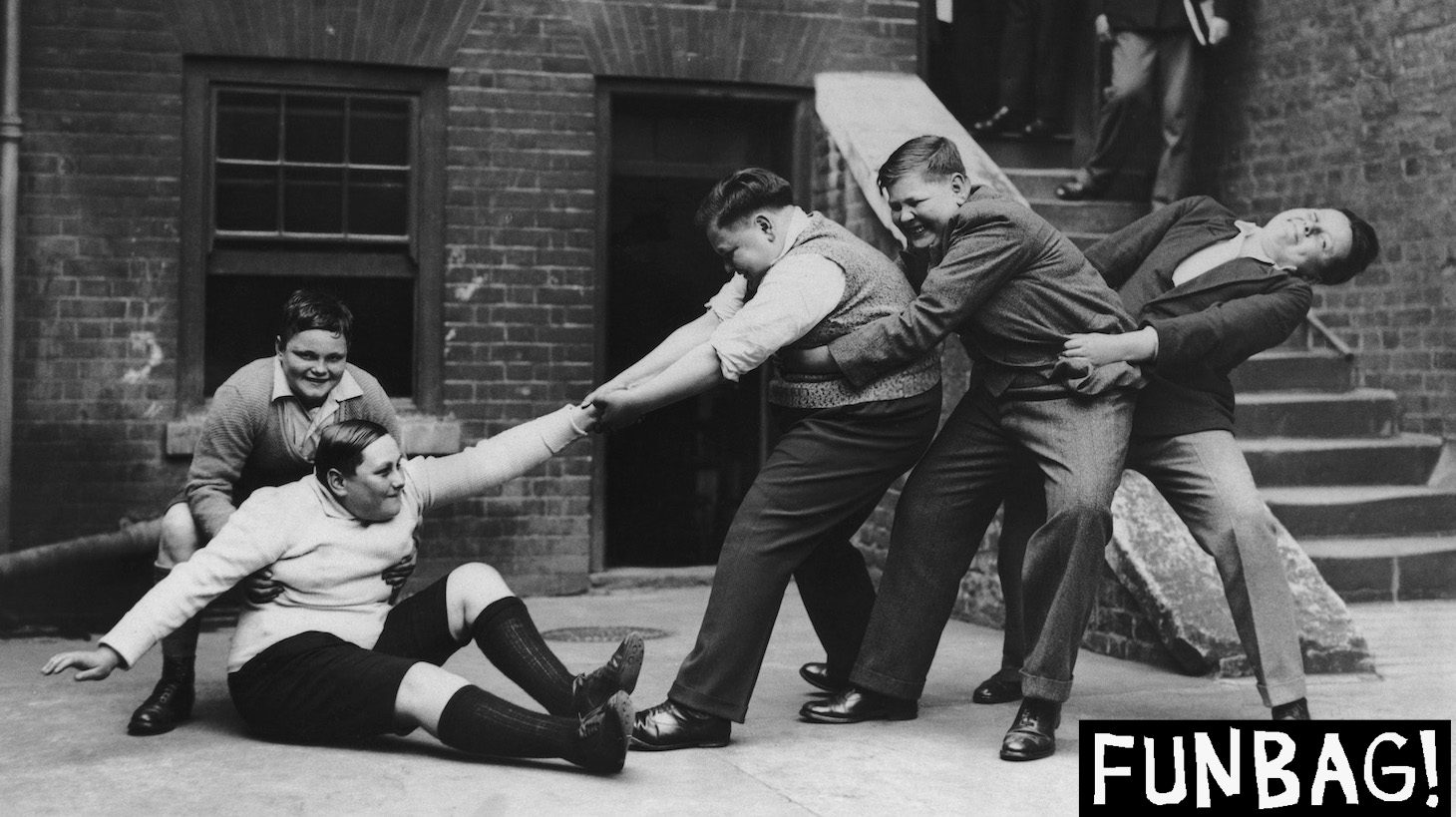 A 13 year-old boy, who weighs 14 stone, is helped to his feet by his companions, 3rd June 1931. They are part of a group of fat boys being entertained to tea at the Guildhall, London, before one of them is chosen to take part in a historical pageant in Rochester, Kent. (Photo by Keystone/FPG/Hulton Archive/Getty Images)