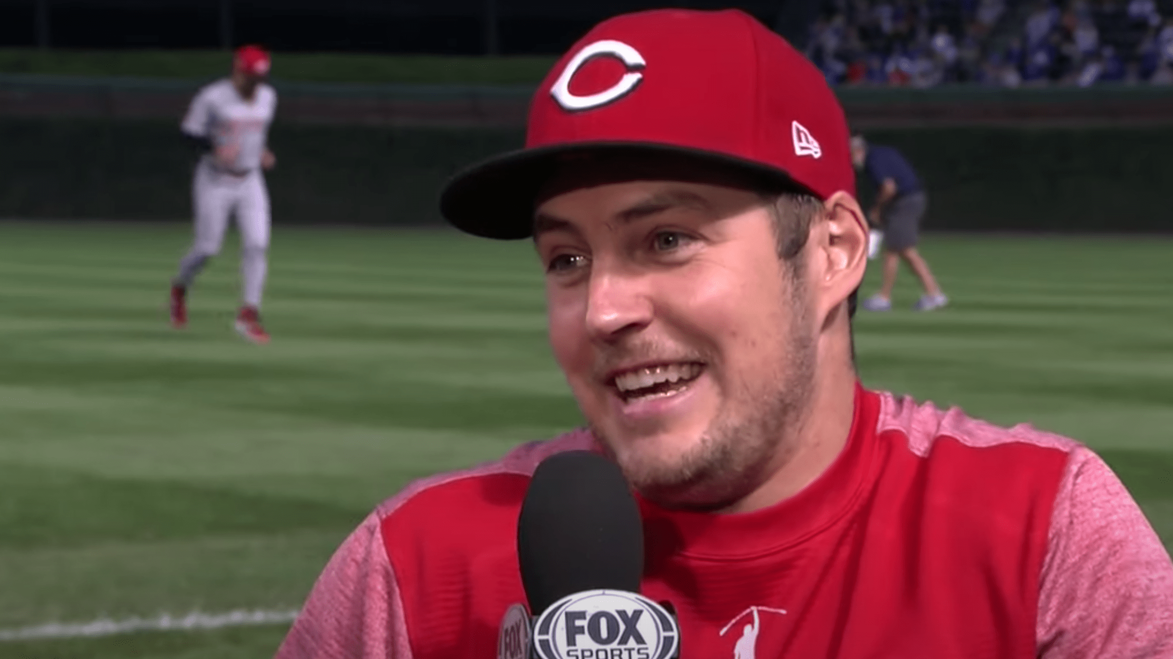 Reds pitcher Trevor Bauer smiles during a pregame interview.