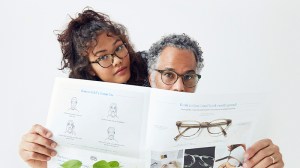 Warby Parker ad of two people reading