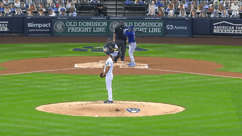 Brewers Pitcher Brent Suter falls over on the mound. It's a GIF.