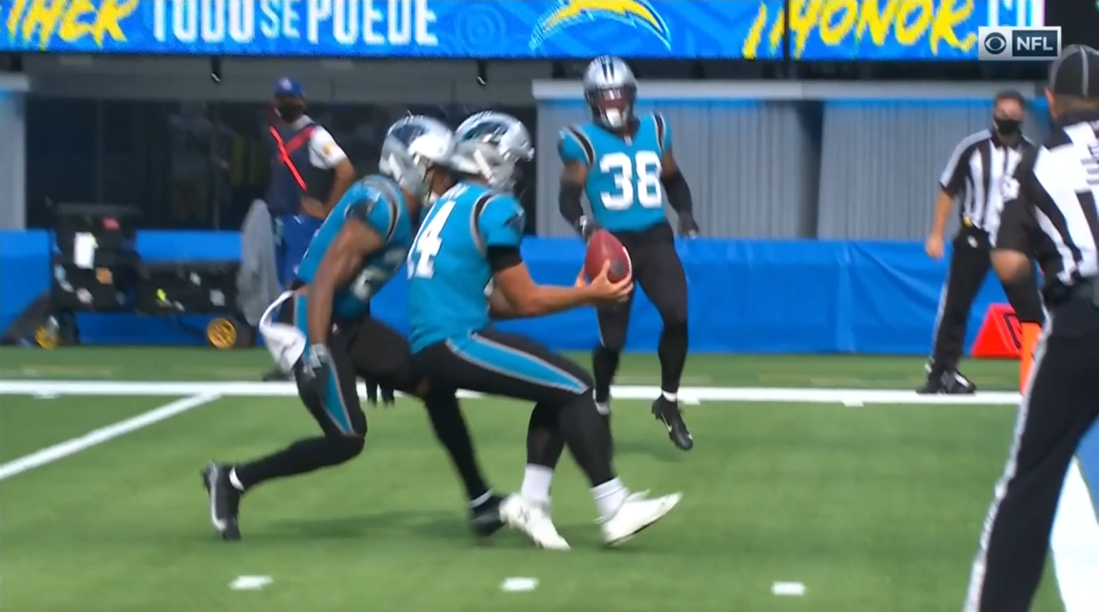 J. J. Jansen downs a punt for the Carolina Panthers near the end zone