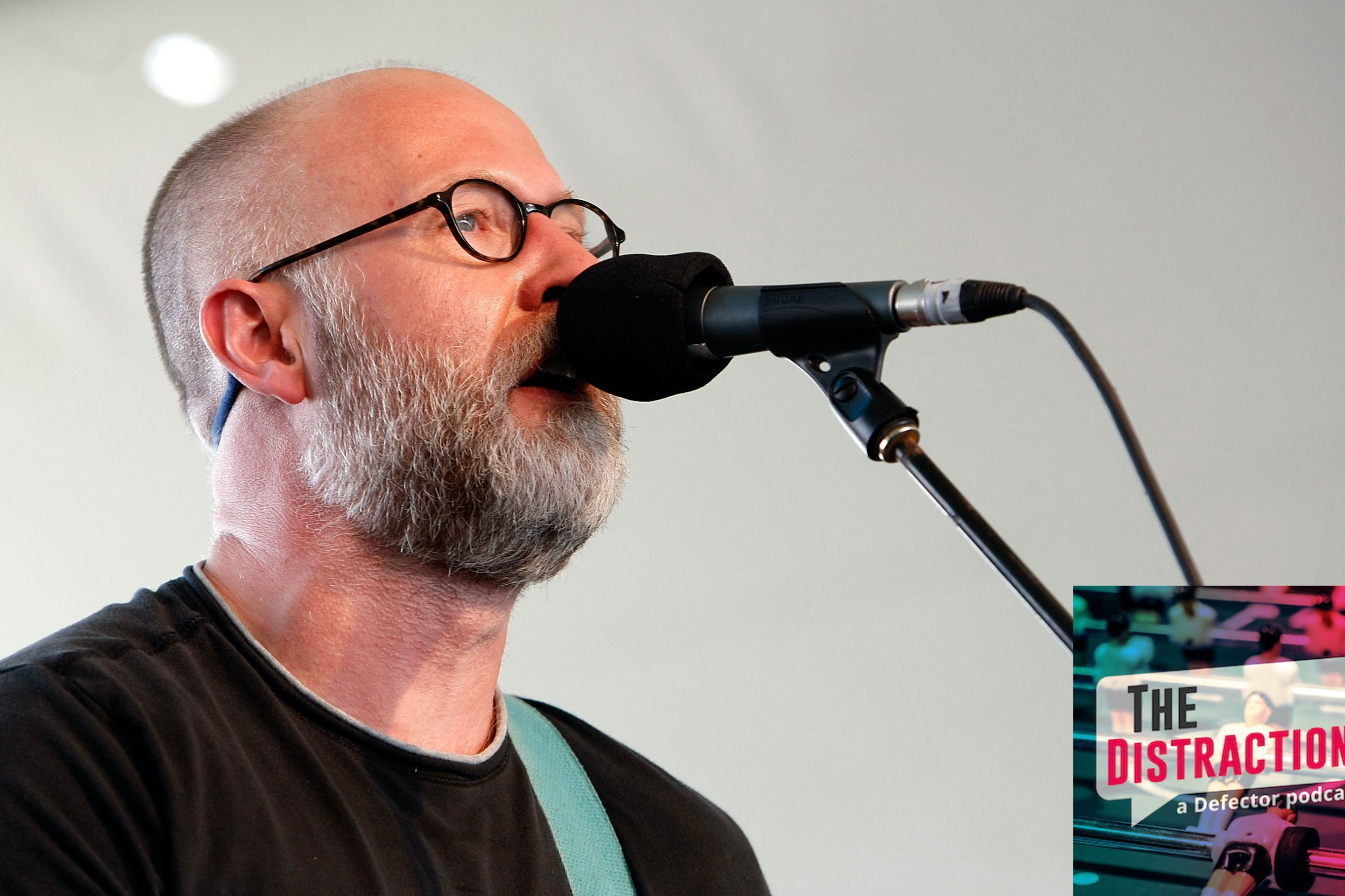 Bob Mould, pictured here not appearing on this podcast but rather performing at Coachella.