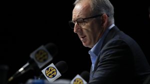 Greg Sankey the commissioner of the SEC, talking into a microphone.