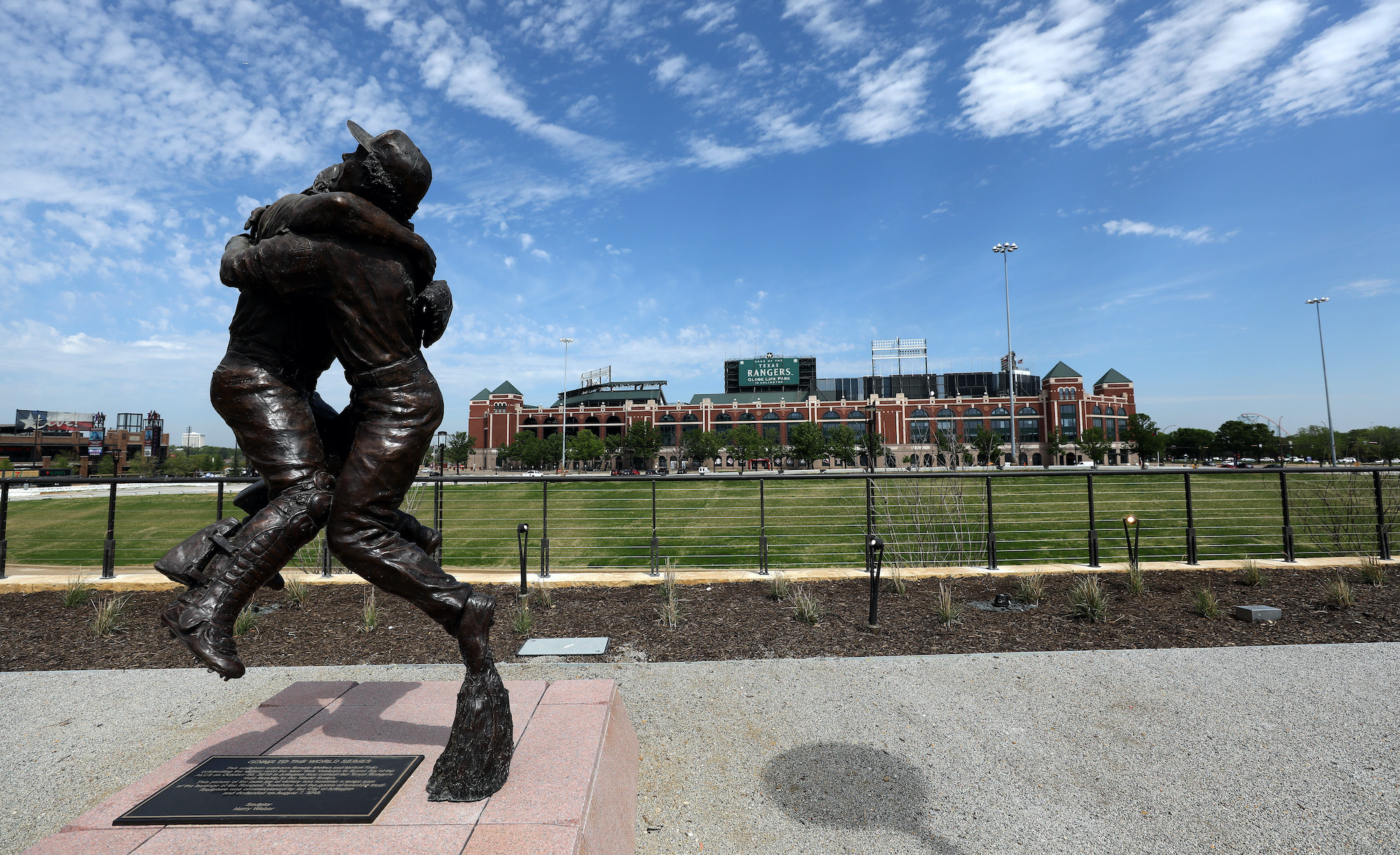ARLINGTON, TEXAS - MARCH 26: The "Going to the World Series" sculpture by Harry Weber is seen in front of Globe Life Park, the prior home of the Texas Rangers on March 26, 2020 in Arlington, Texas. The Rangers had to delay their March 31, 2020 debut opening of Globe Life Field after Major League Baseball postponed the start of its season due to the COVID-19 outbreak. (Photo by Ronald Martinez/Getty Images)