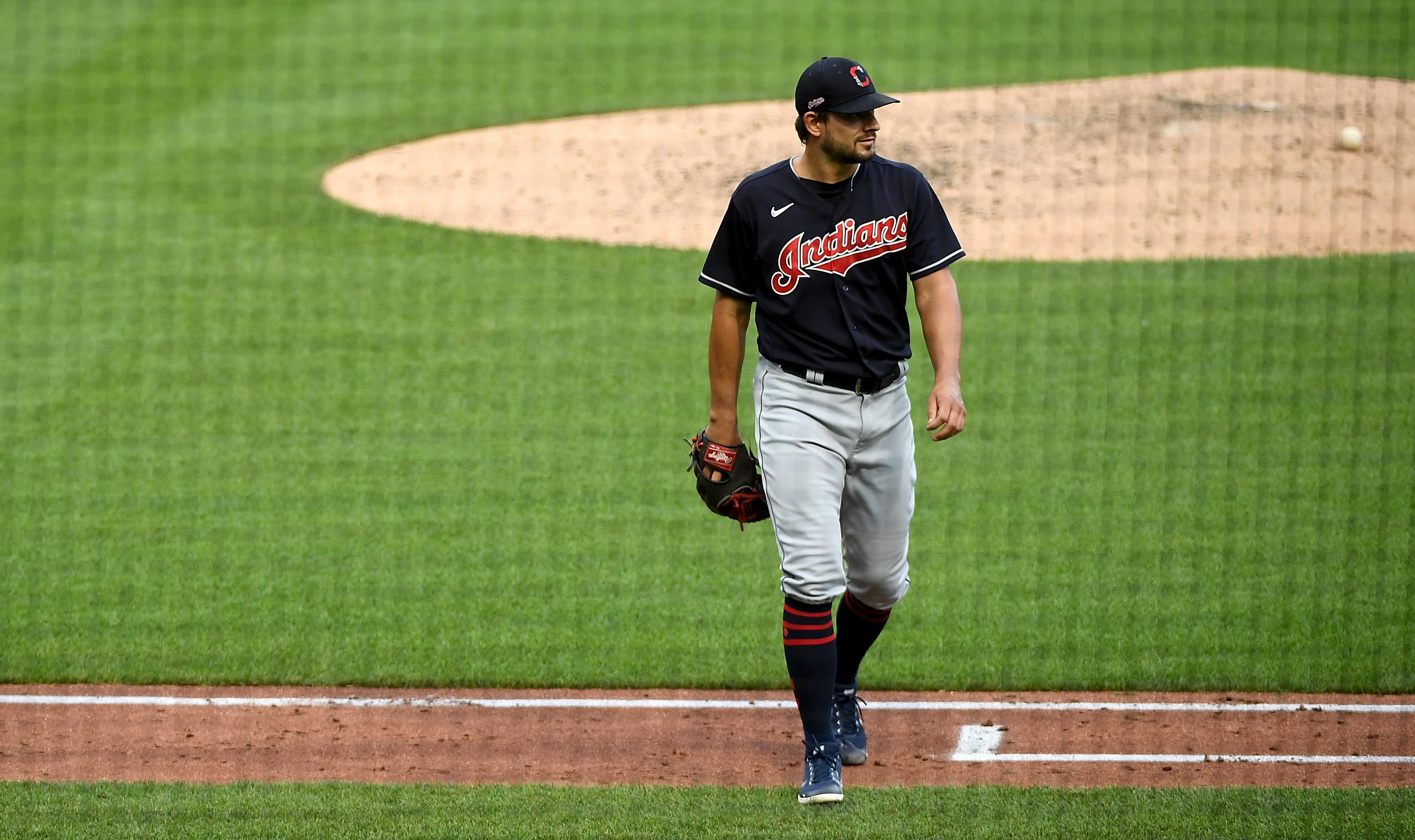 Brad Hand walks off after getting the last out of an exhibition game in Pittsburgh, in July.