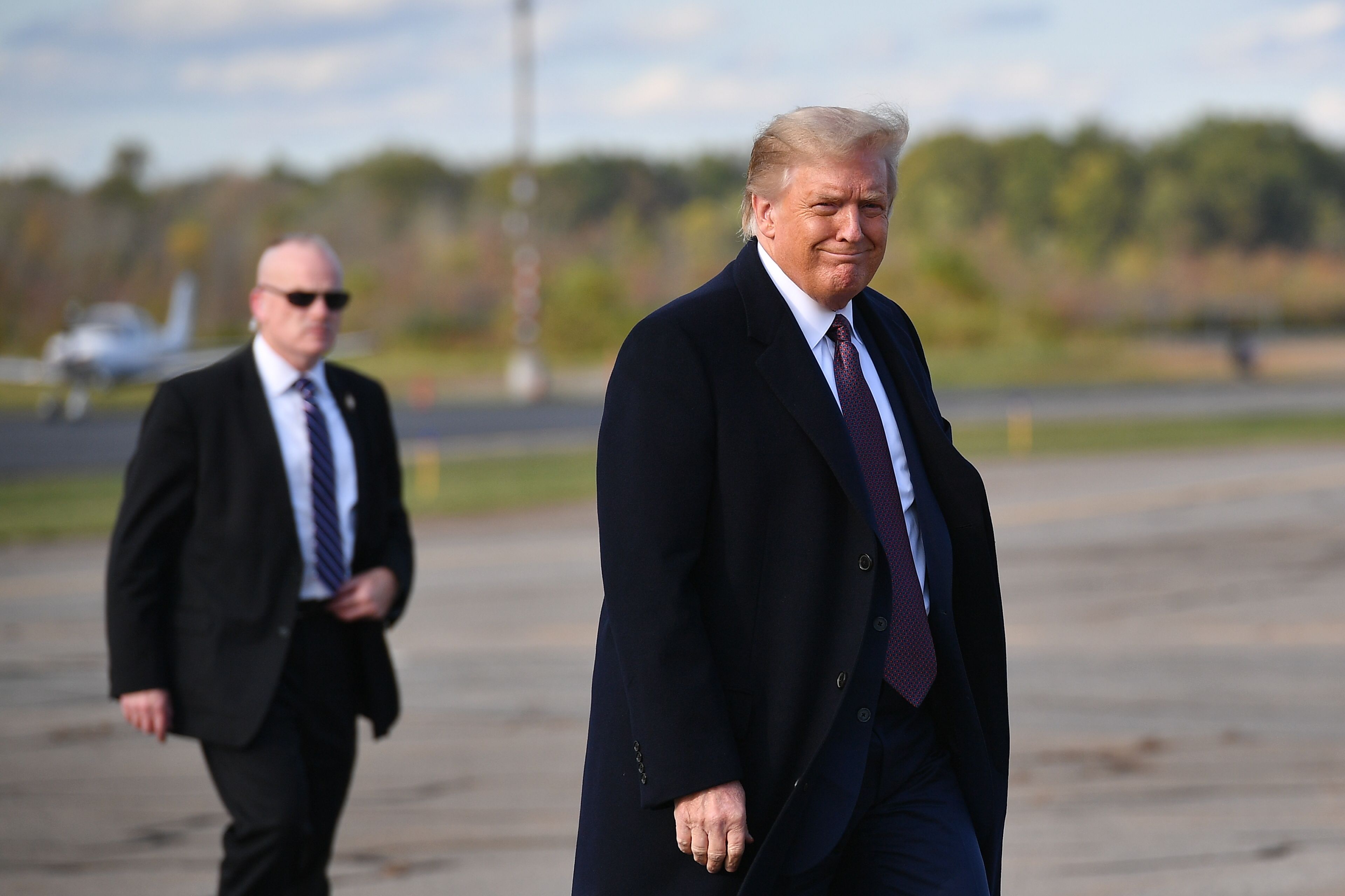Donald Trump, seen here heading to a fundraiser where he might've exposed 100 people to the virus he has.