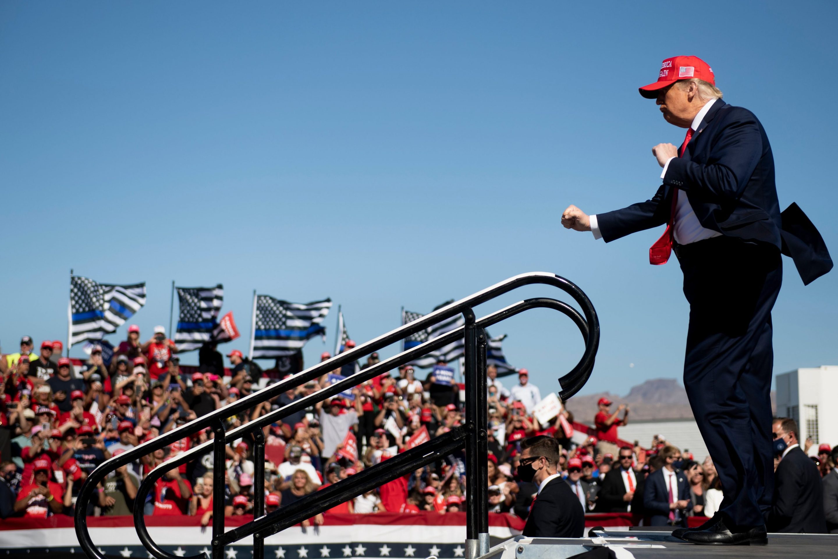 US President Donald Trump dances as he leaves after speaking during a Make America Great Again rally