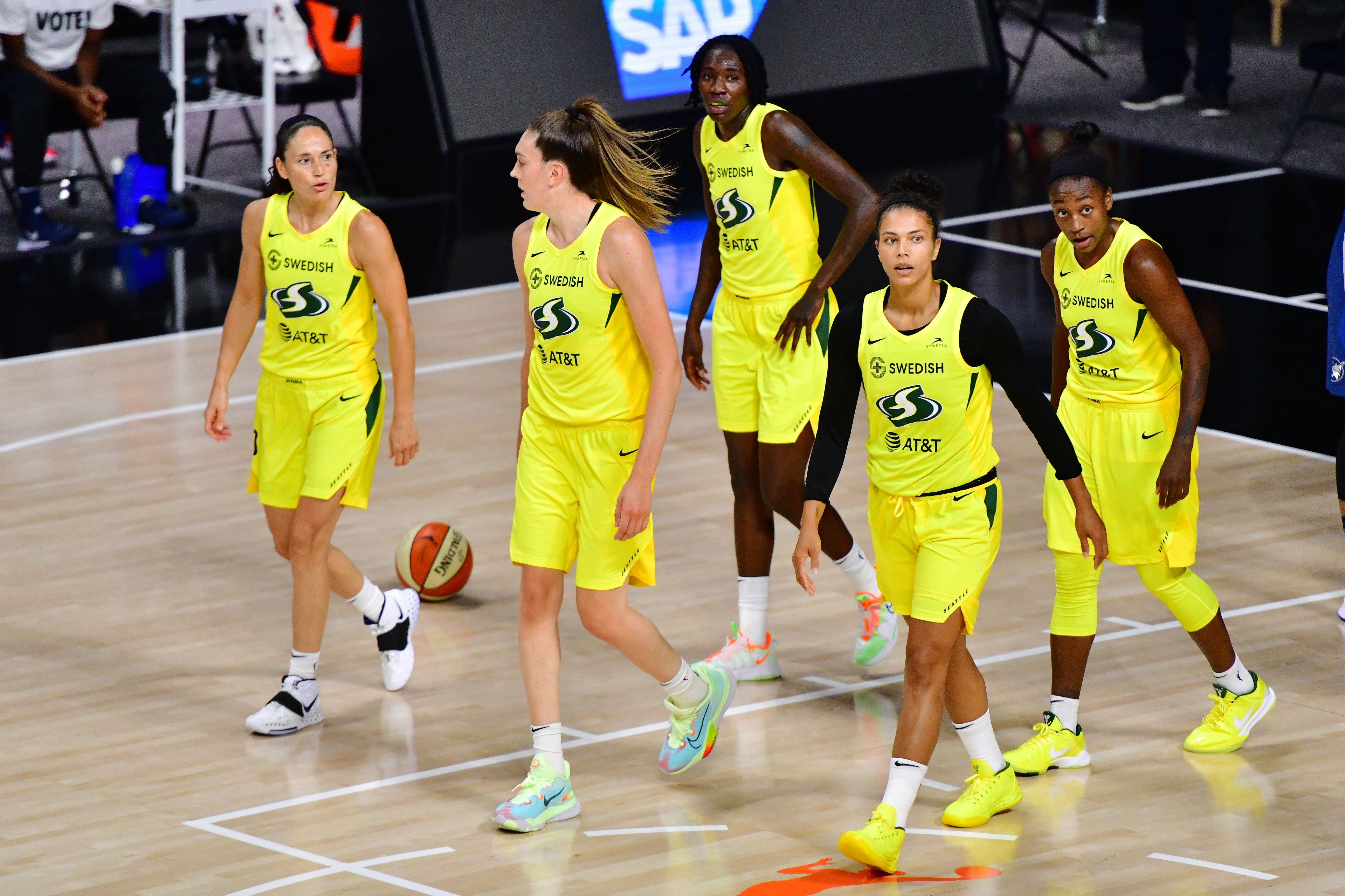 Sue Bird #10, Breanna Stewart #30, Natasha Howard #6, Alysha Clark #32, and Jewell Loyd #24 of the Seattle Storm walk across the court after a foul during the first half of Game One of their Third Round playoff against the Minnesota Lynx at Feld Entertainment Center on September 22, 2020 in Palmetto, Florida.