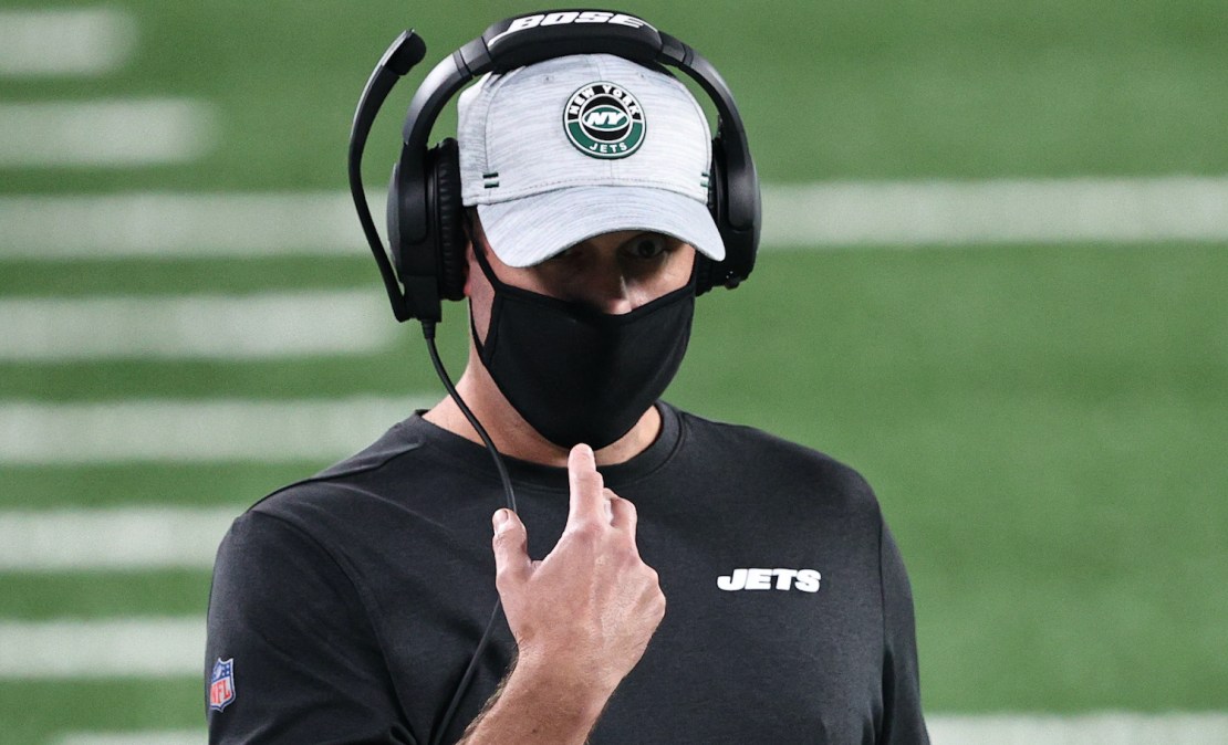 EAST RUTHERFORD, NEW JERSEY - OCTOBER 01: Head coach Adam Gase of the New York Jets looks on against the Denver Broncos during the second quarter at MetLife Stadium on October 01, 2020 in East Rutherford, New Jersey. (Photo by Elsa/Getty Images)