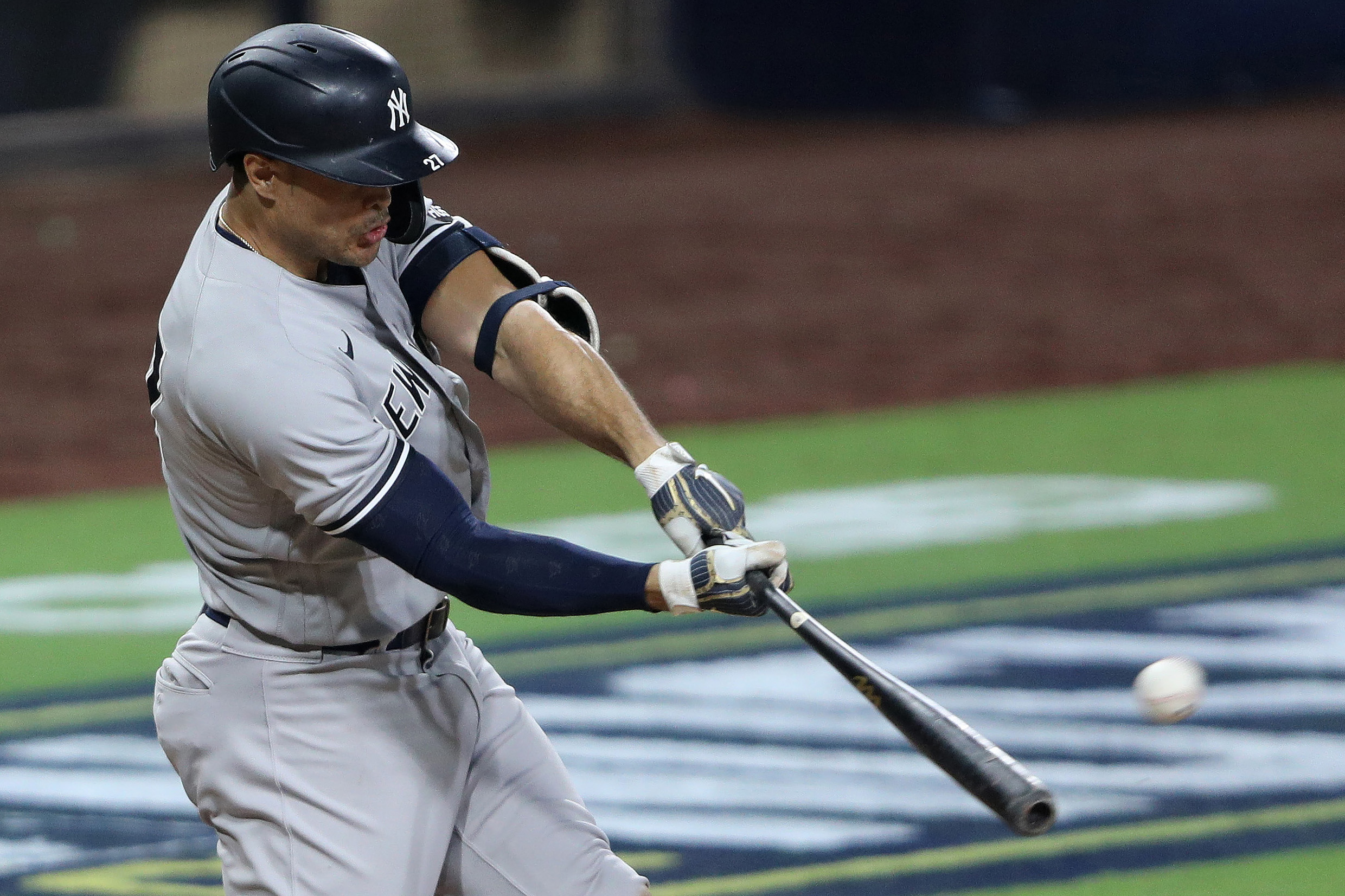 Giancarlo Stanton #27 of the New York Yankees hits a grand slam