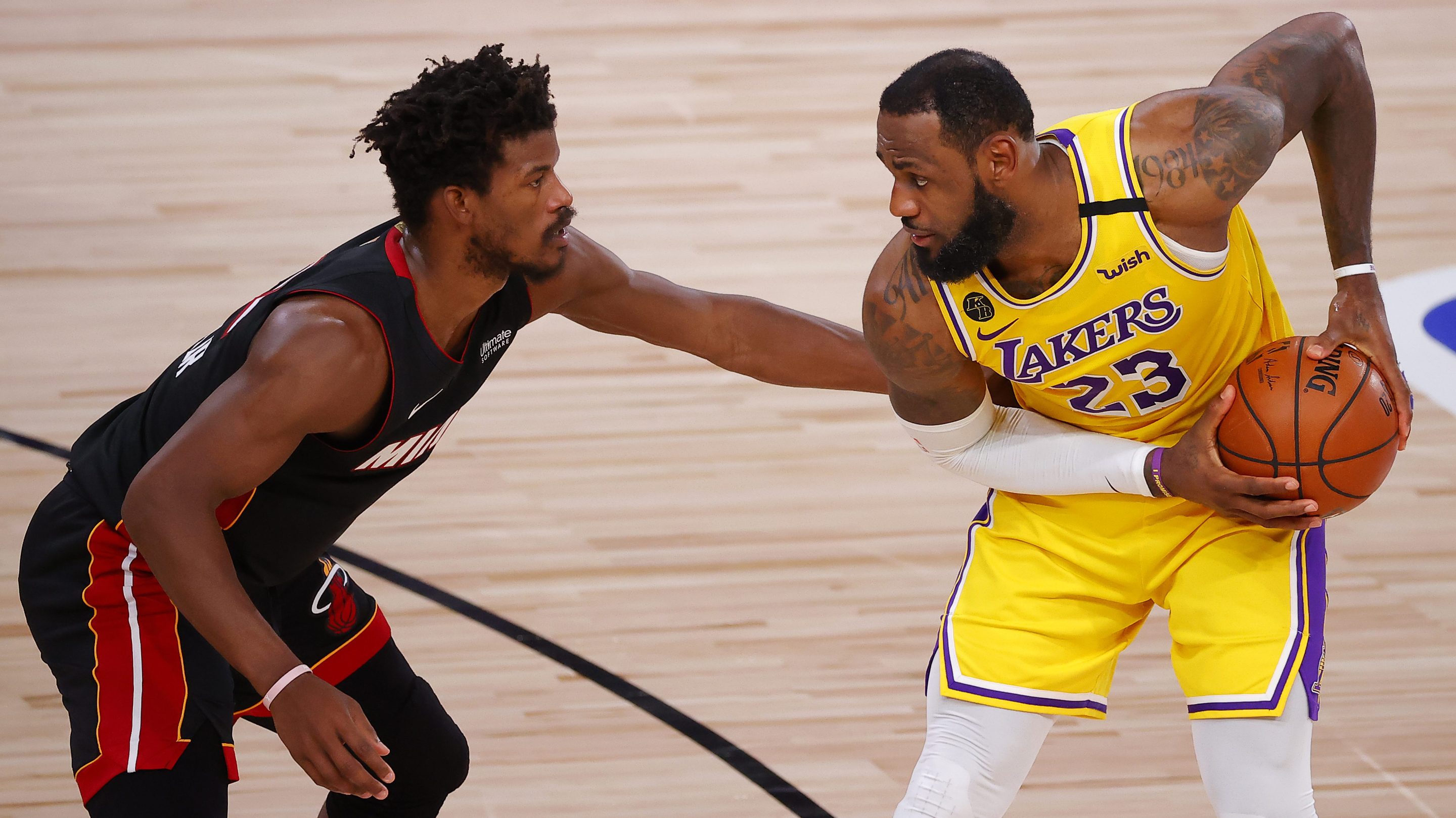 Jimmy Butler #22 of the Miami Heat defends LeBron James #23 of the Los Angeles Lakers during the fourth quarter in Game Four of the 2020 NBA Finals