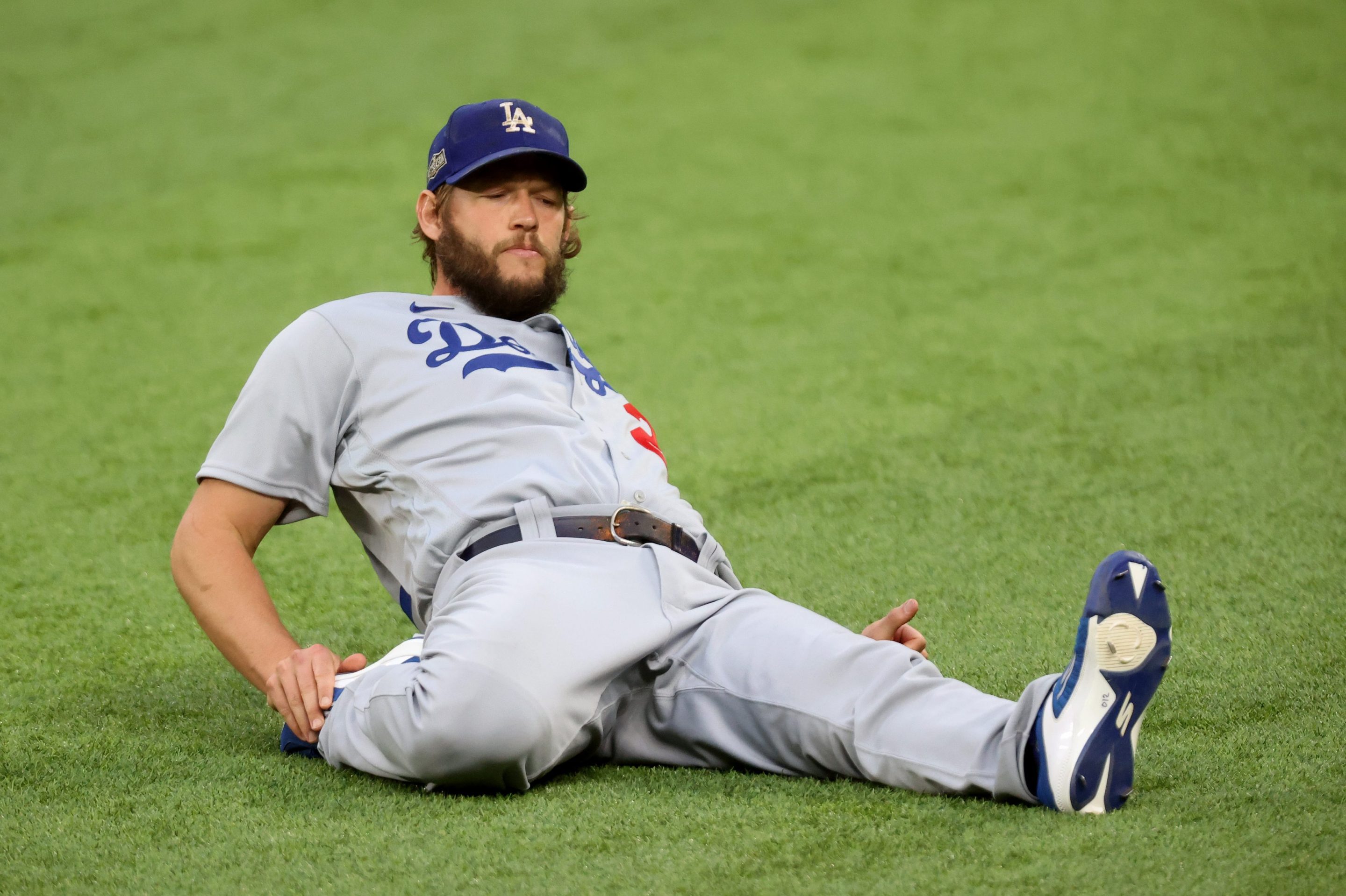 Clayton Kershaw #22 of the Los Angeles Dodgers warms up prior to Game Four