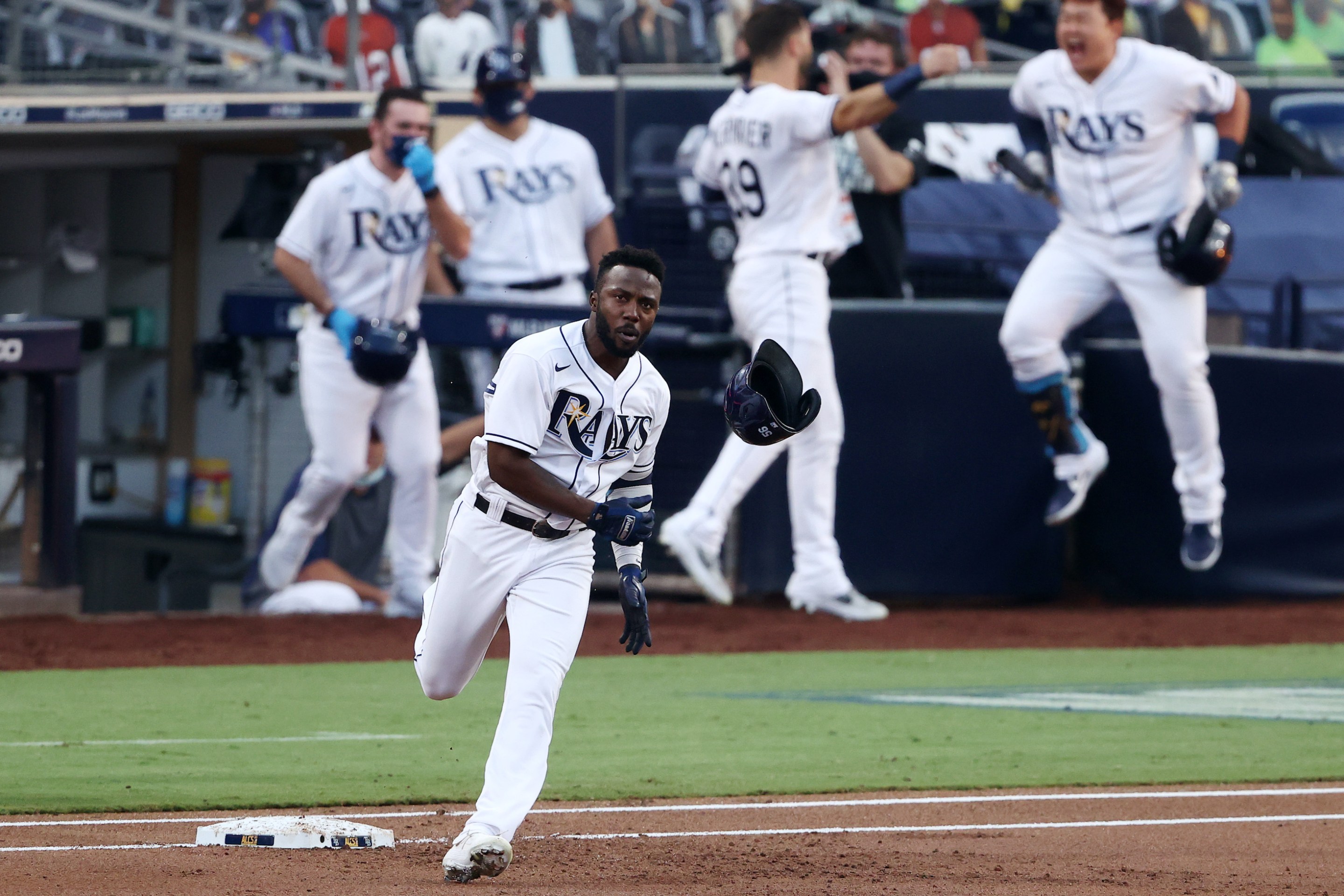Randy Arozarena of the Tampa Bay Rays rounds the bases after hitting a home run in Game 7 of the ALCS