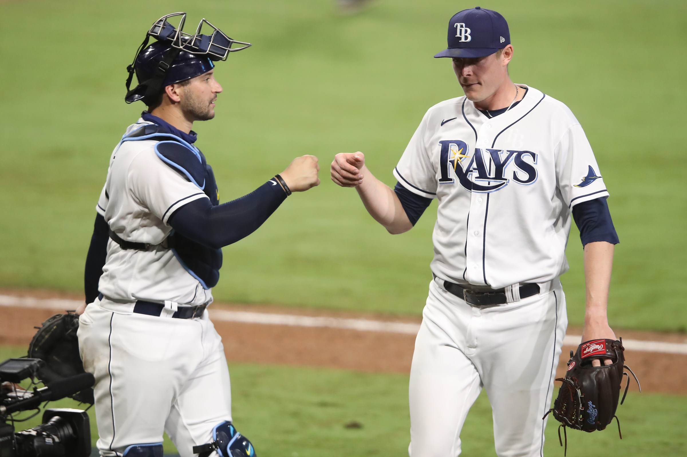 Mike Zunino congratulates Peter Fairbanks, one of the Rays' 23 excellent relievers.