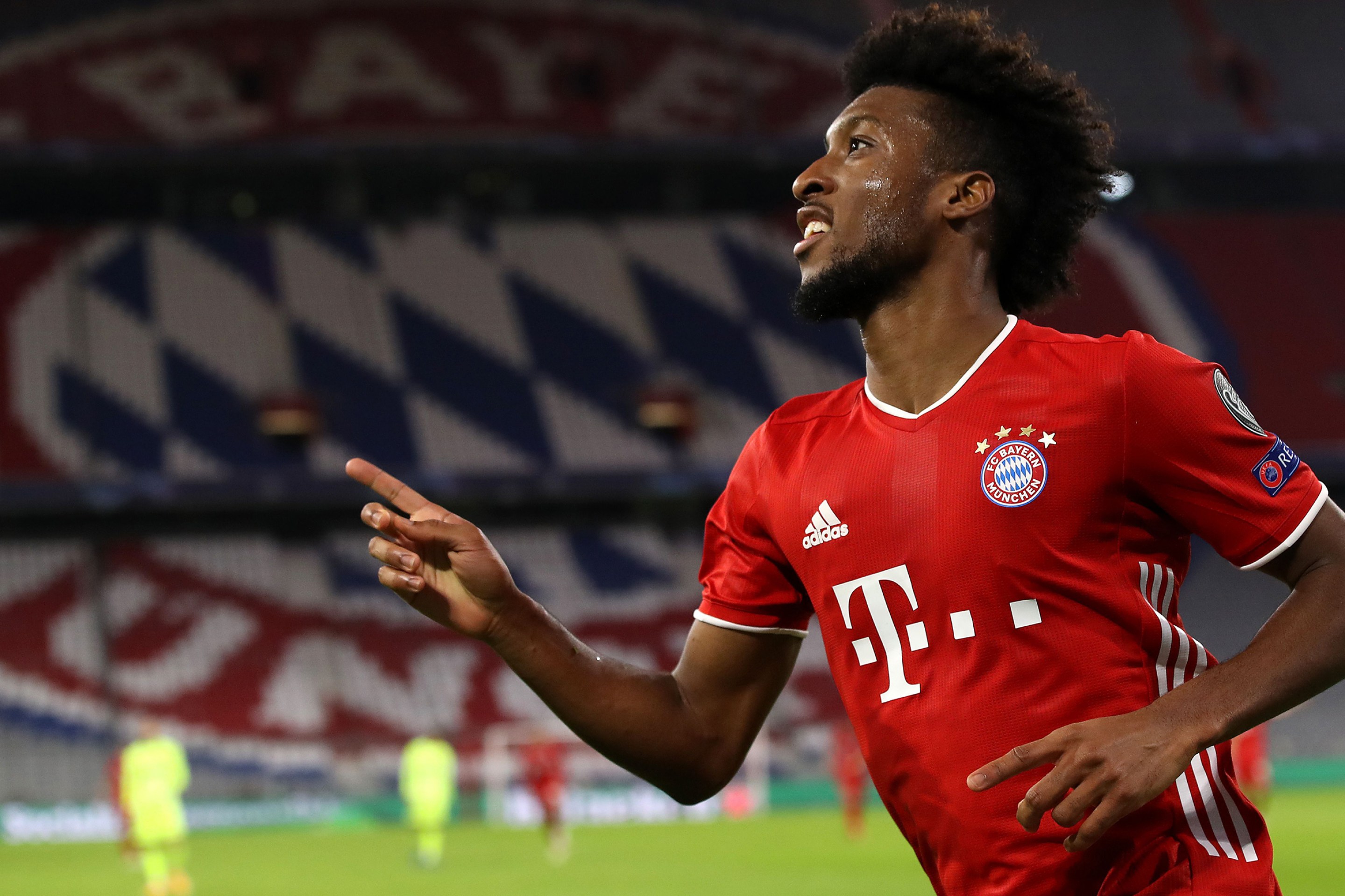 Kingsley Coman of FC Bayern München celebrates scoring the 4th team goal during the UEFA Champions League Group A stage match between FC Bayern Muenchen and Atletico Madrid