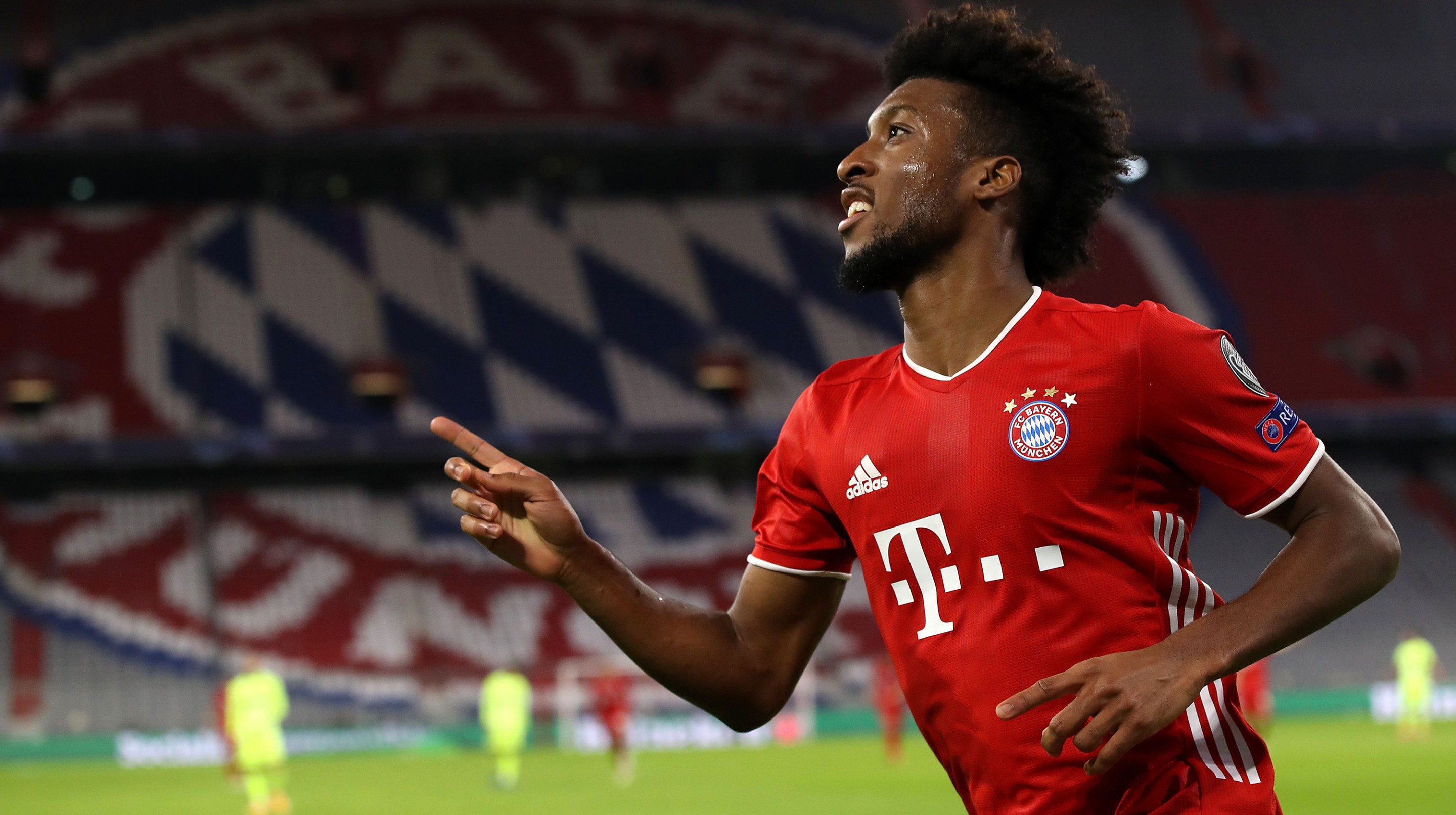 Kingsley Coman of FC Bayern München celebrates scoring the 4th team goal during the UEFA Champions League Group A stage match between FC Bayern Muenchen and Atletico Madrid