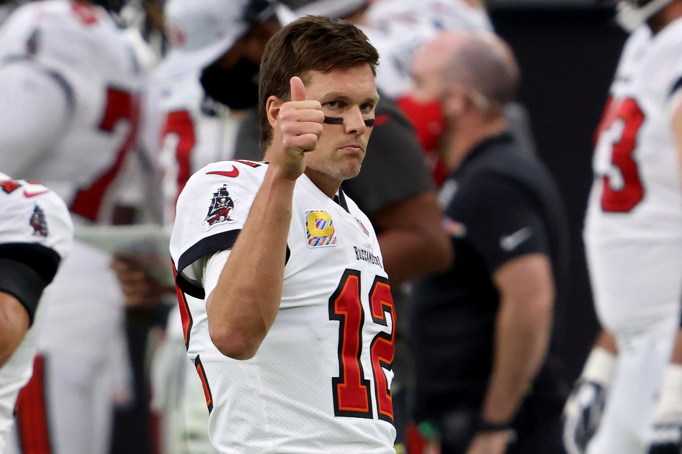 Tampa Bay Buccaneers quarterback Tom Brady sticks his thumb up.