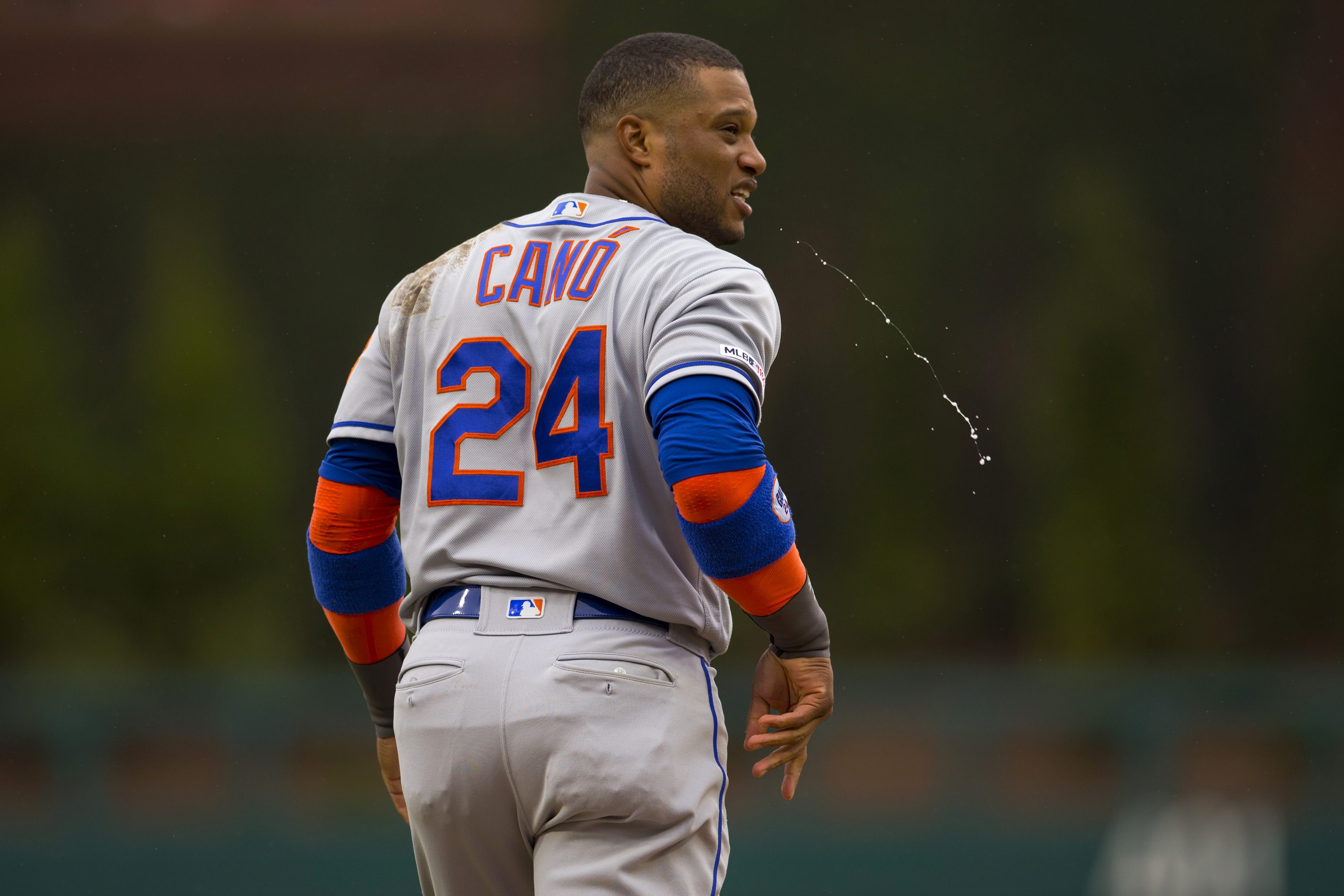 Robinson Cano #24 of the New York Mets spits