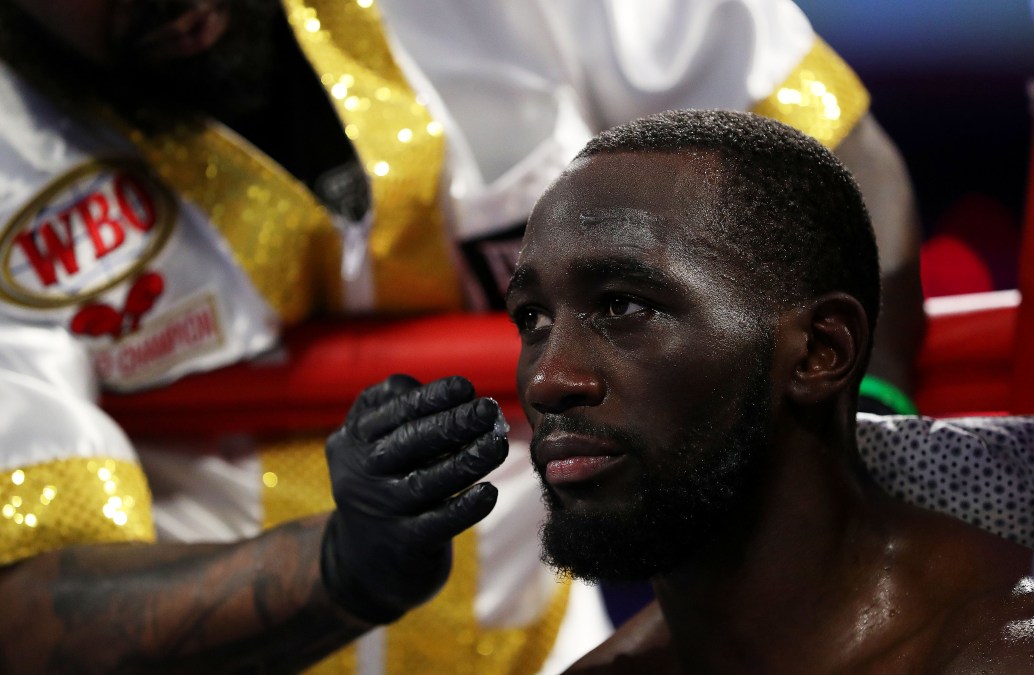 Terence Crawford looks on