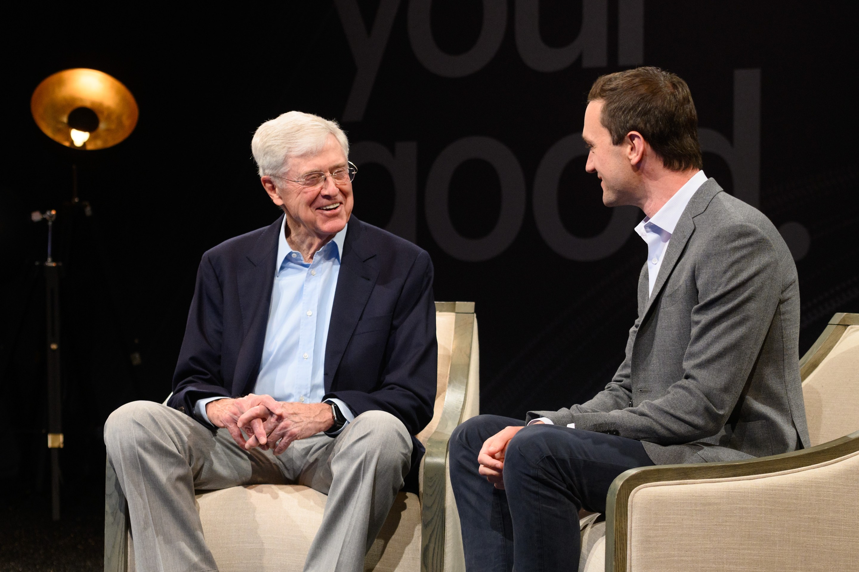 Charles Koch, a billionaire menace to society, speaks to his co-author Brian Hooks