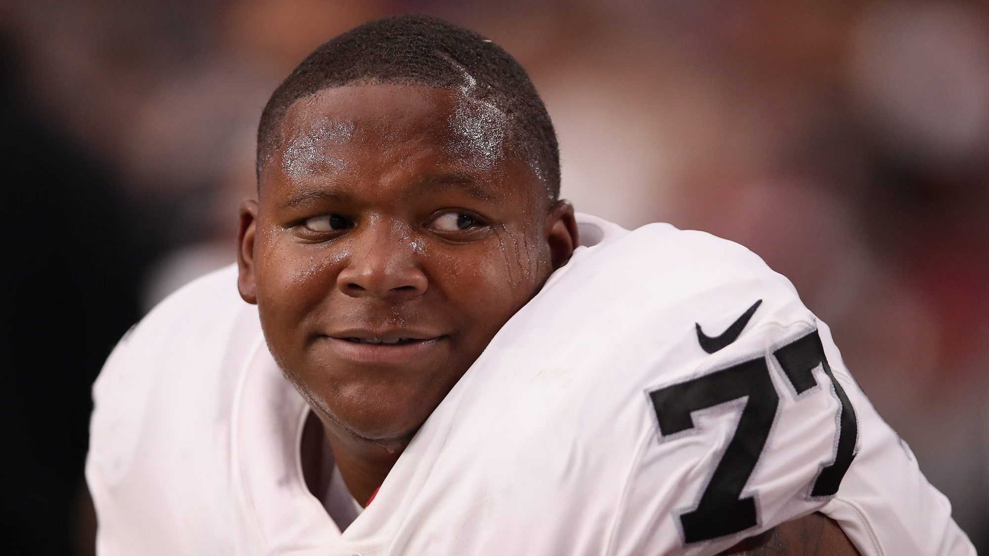 Trent Brown of the Raiders chills on the sideline during a game against the Cardinals earlier this season.