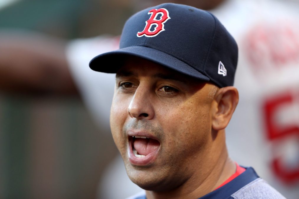 Alex Cora makes a stupid face as manager of the Boston Red Sox, back before he was fired for being a cheater.