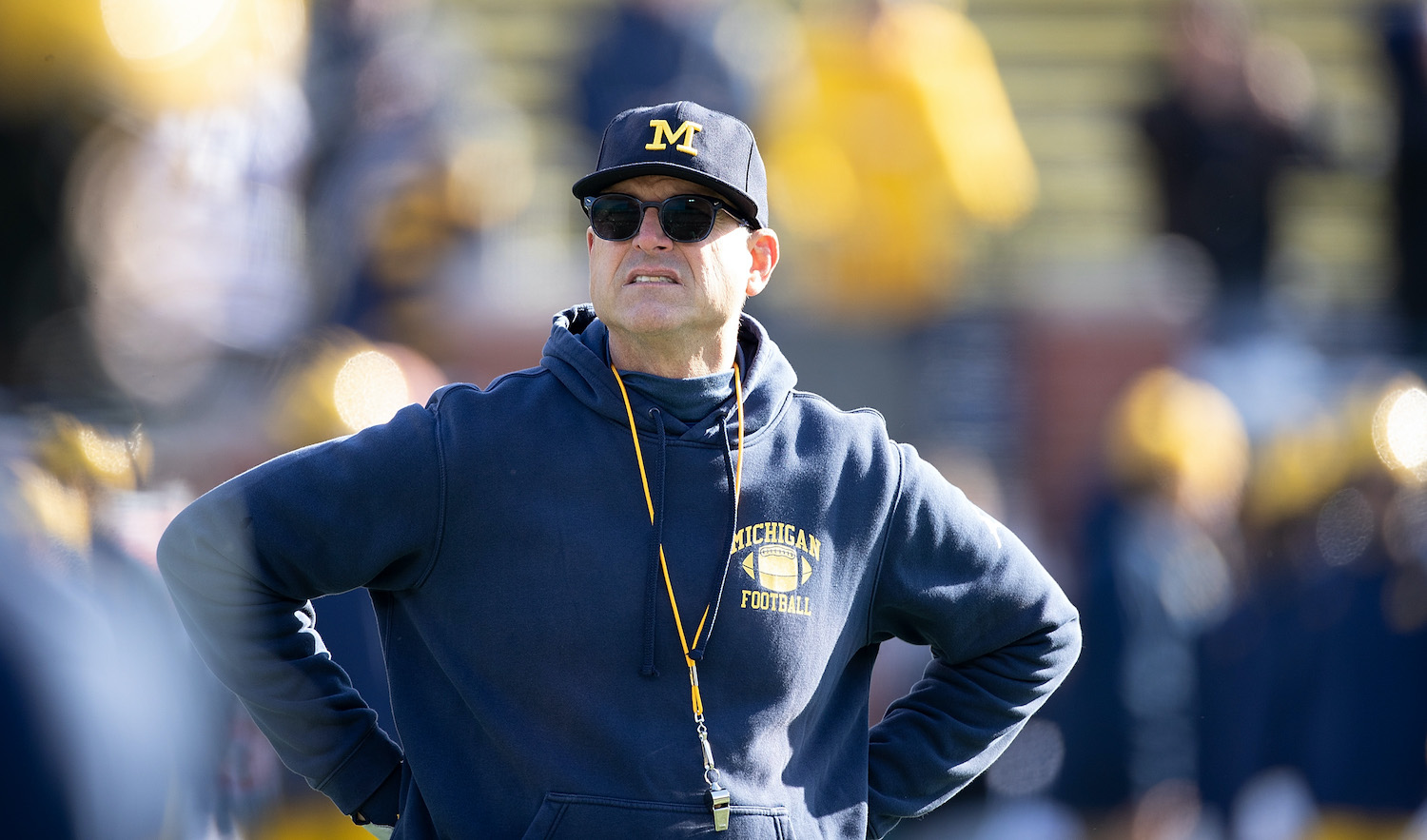 ANN ARBOR, MI - NOVEMBER 16: Michigan Wolverines head football coach Jim Harbaugh watches the pregame warm ups prior to the start of the game against the Michigan State Spartans at Michigan Stadium on November 16, 2019 in Ann Arbor, Michigan. (Photo by Leon Halip/Getty Images)