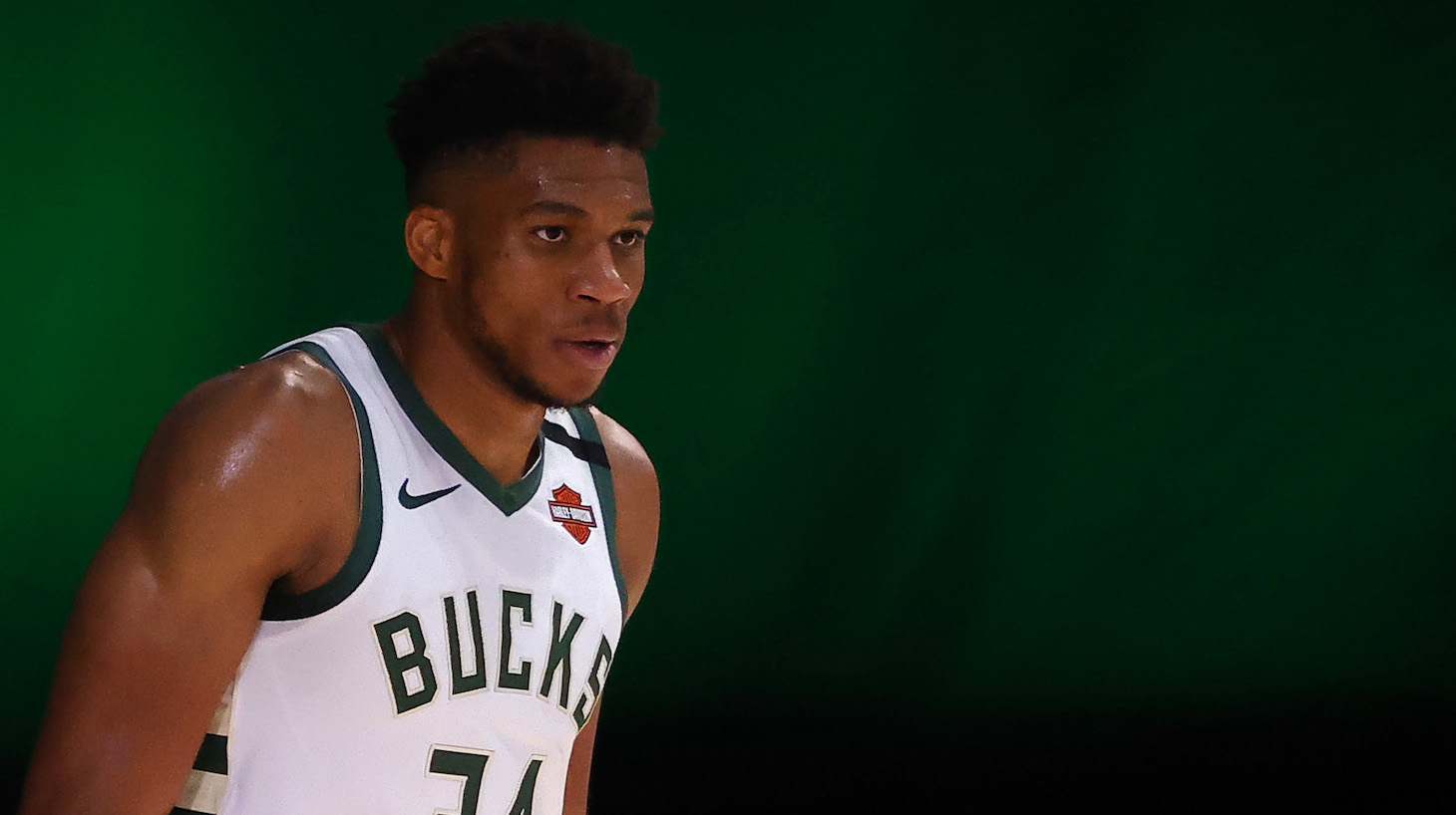 LAKE BUENA VISTA, FLORIDA - AUGUST 29: Giannis Antetokounmpo #34 of the Milwaukee Bucks looks on against the Orlando Magic during the third quarter in Game Five of the Eastern Conference First Round during the 2020 NBA Playoffs at AdventHealth Arena at ESPN Wide World Of Sports Complex on August 29, 2020 in Lake Buena Vista, Florida. NOTE TO USER: User expressly acknowledges and agrees that, by downloading and or using this photograph, User is consenting to the terms and conditions of the Getty Images License Agreement. (Photo by Kevin C. Cox/Getty Images)