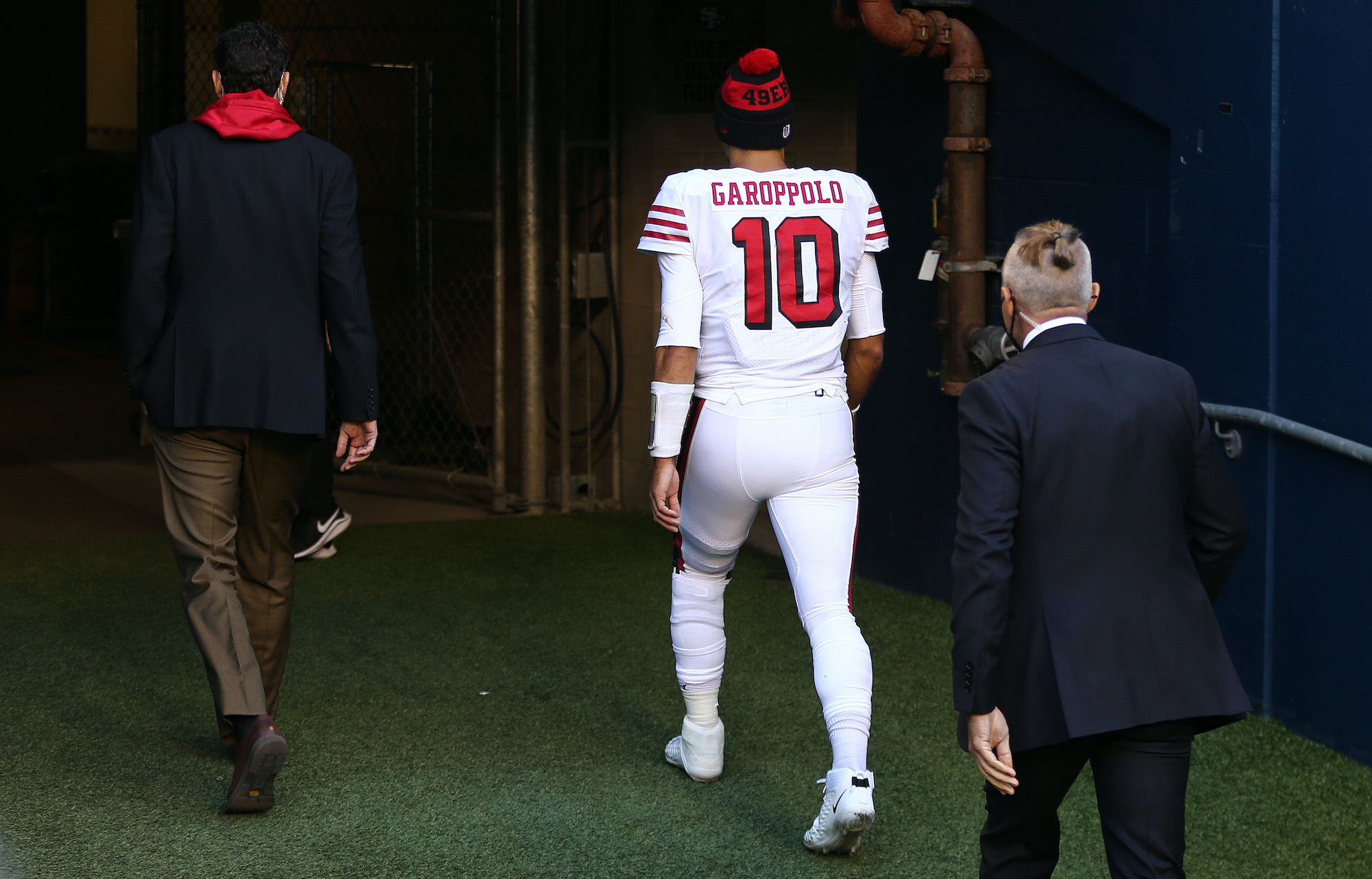 SEATTLE, WASHINGTON - NOVEMBER 01: Quarterback Jimmy Garoppolo #10 of the San Francisco 49ers exits the field as they play the at the start of the fourth quarter of the game at CenturyLink Field on November 01, 2020 in Seattle, Washington. (Photo by Abbie Parr/Getty Images)